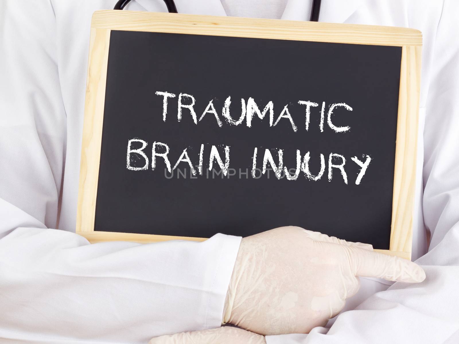 Doctor shows information: traumatic brain injury by gwolters