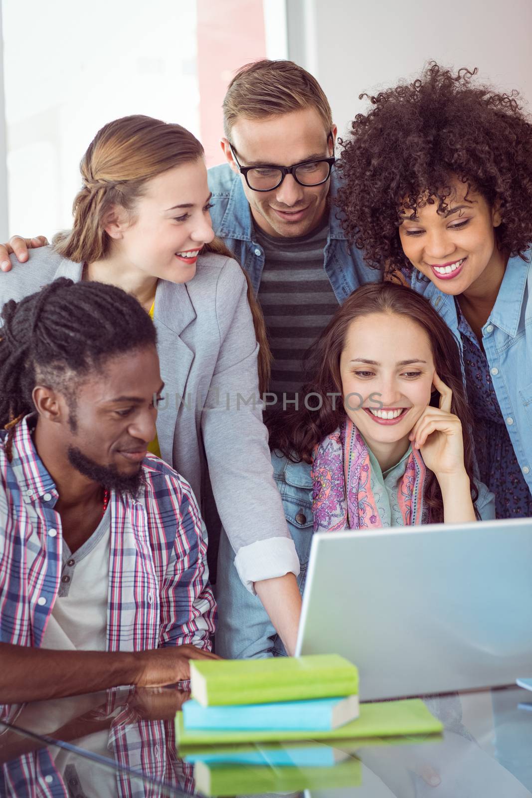 Fashion students working as a team  by Wavebreakmedia