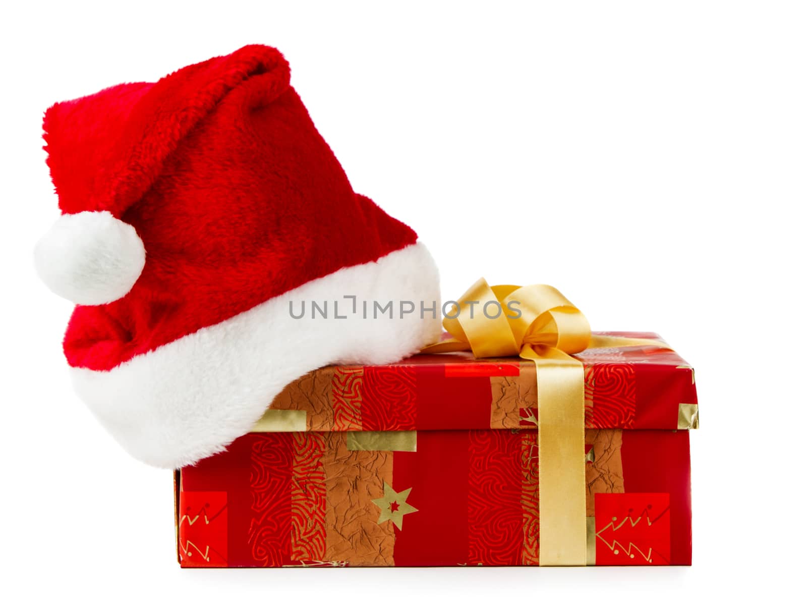 Christmas present with Santa hat isolated on white background