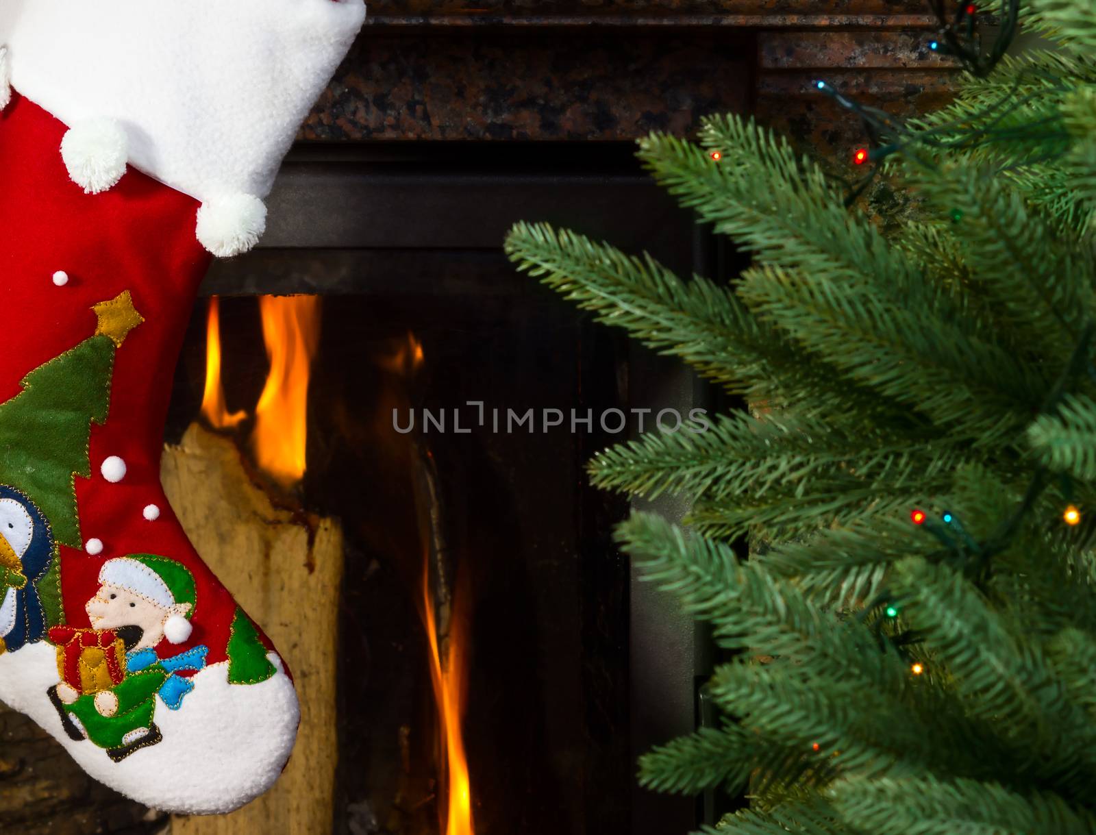 Close up view of Christmas stocking on fire place background