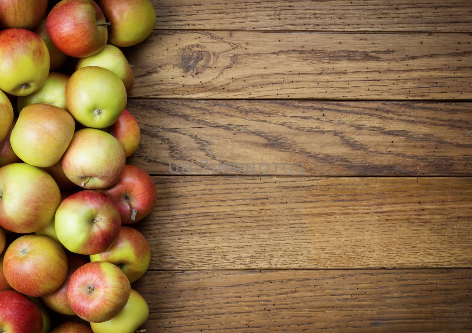 Apples on wooden background