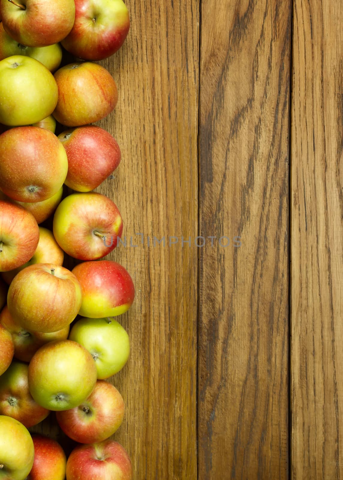 Apples on wooden background