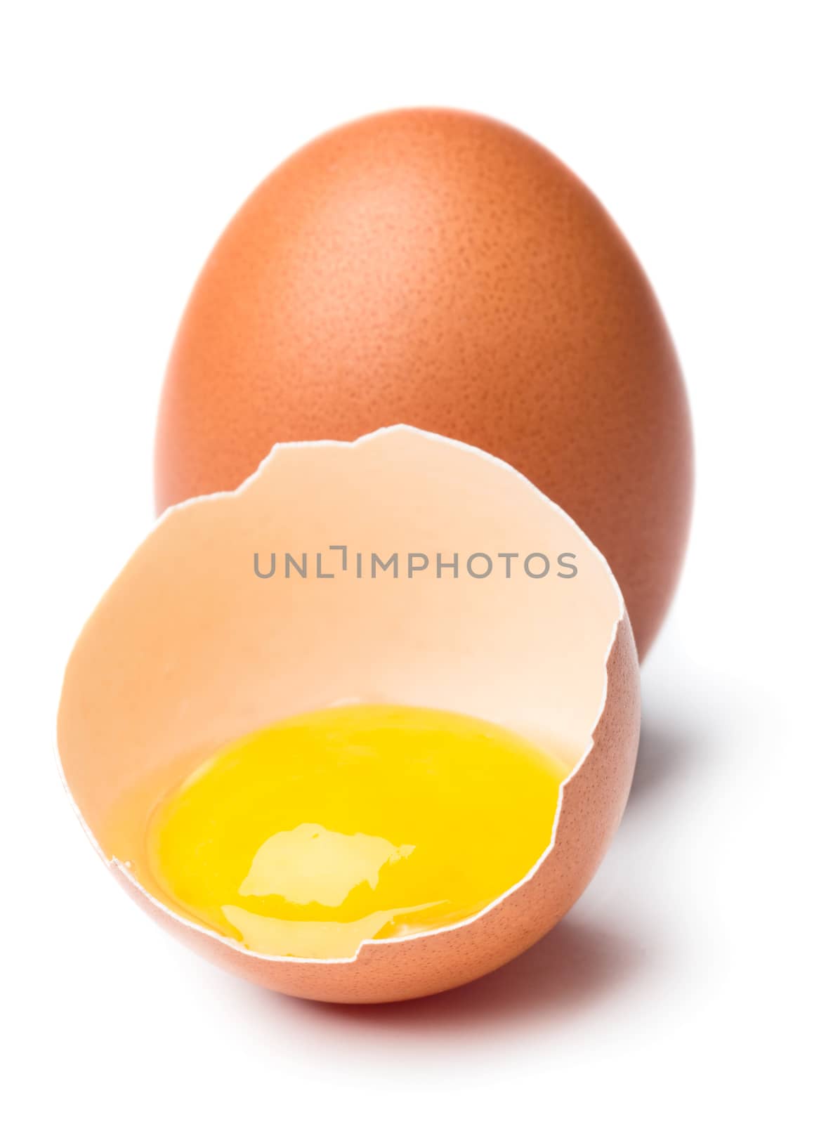 Broken egg isolated on white background