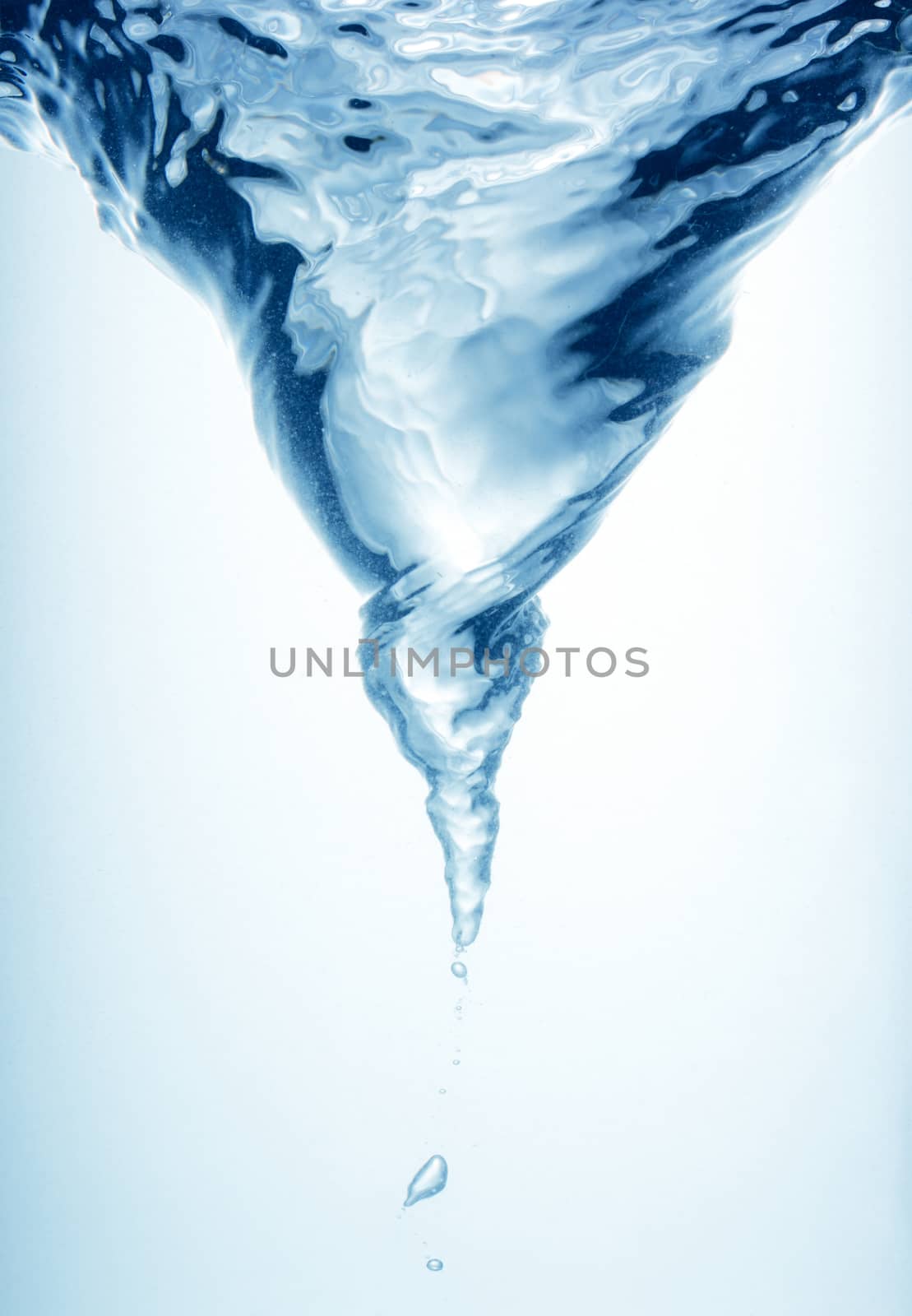 Whirlpool underwater in blue