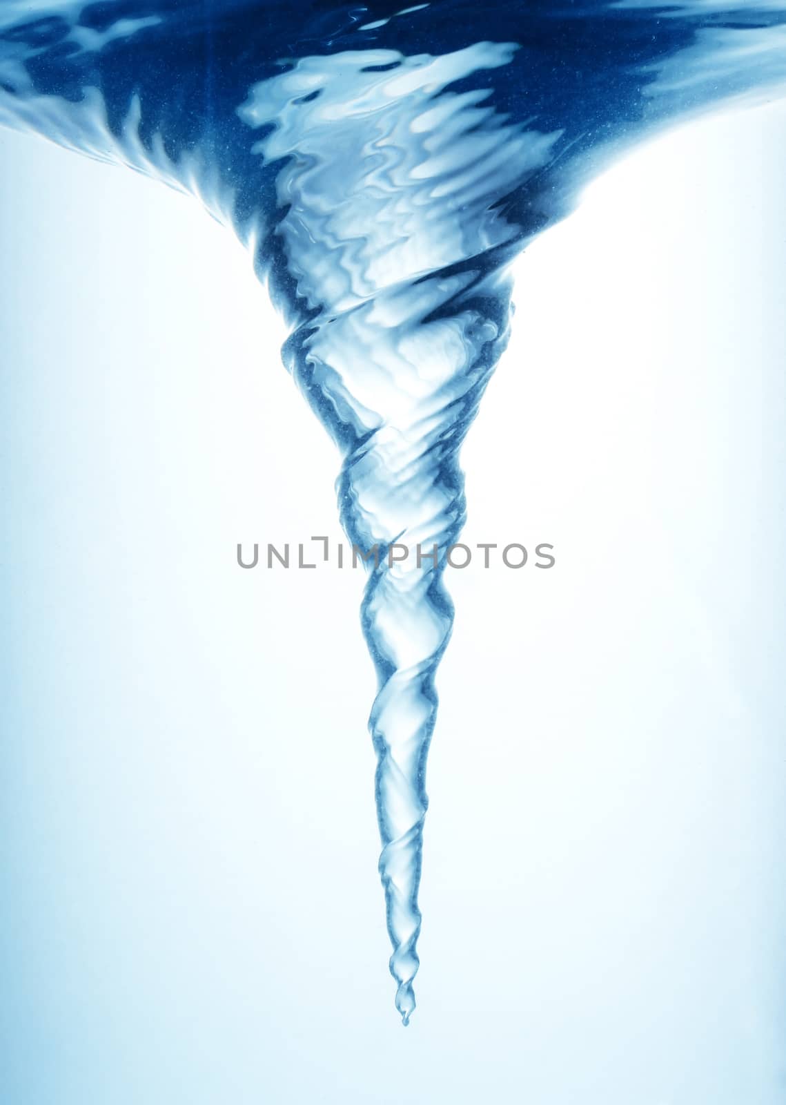 Whirlpool underwater in blue clean transparent water