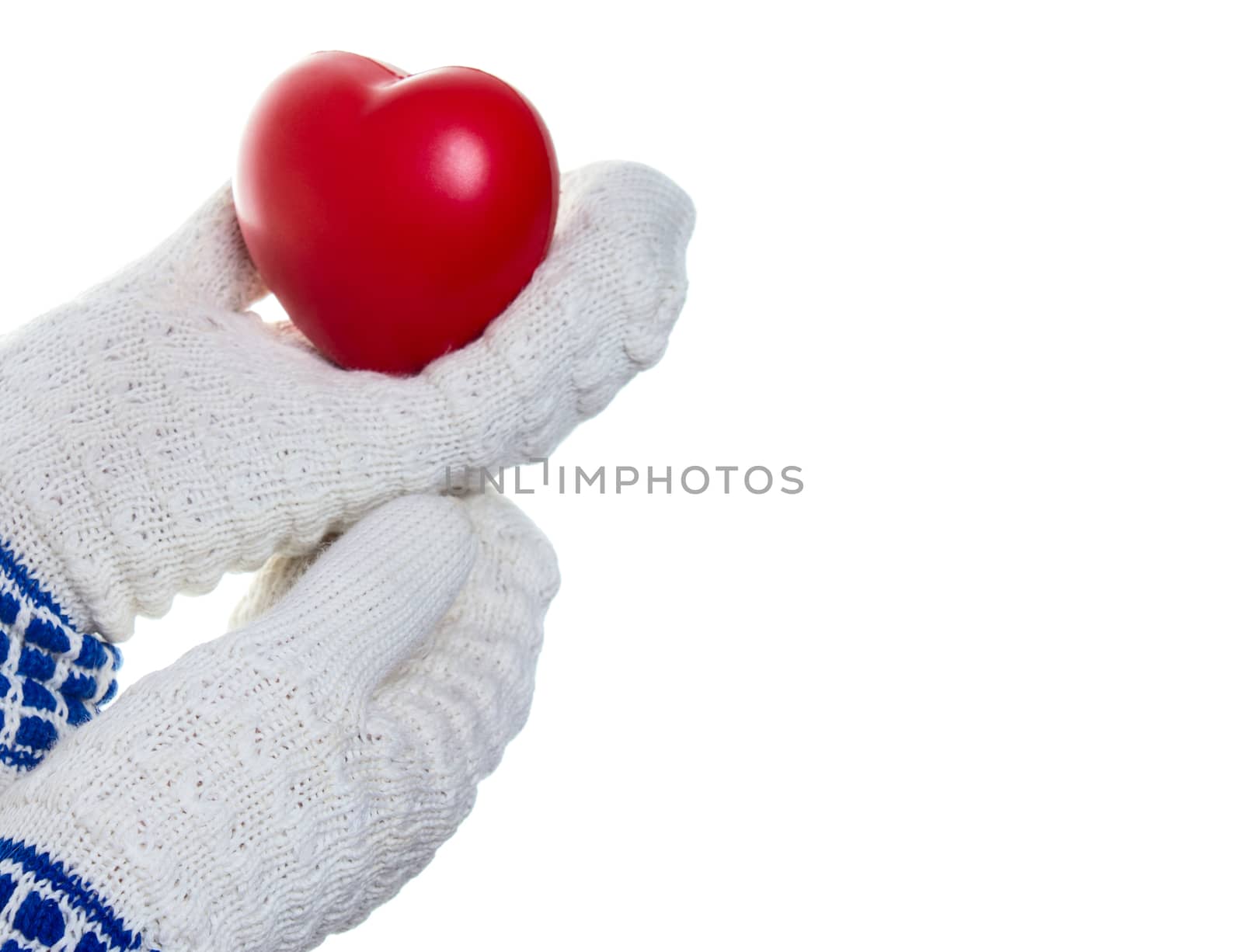 Red heart in woman hands isolated on white background