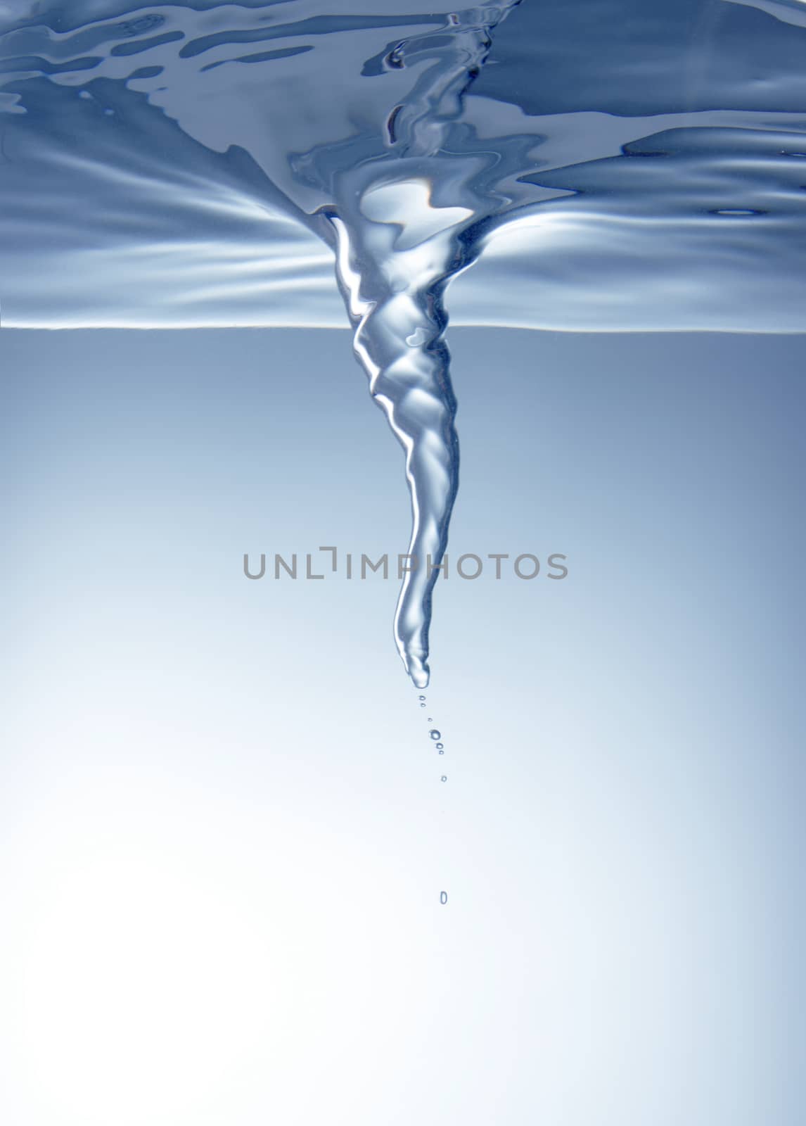 Whirlpool underwater in blue