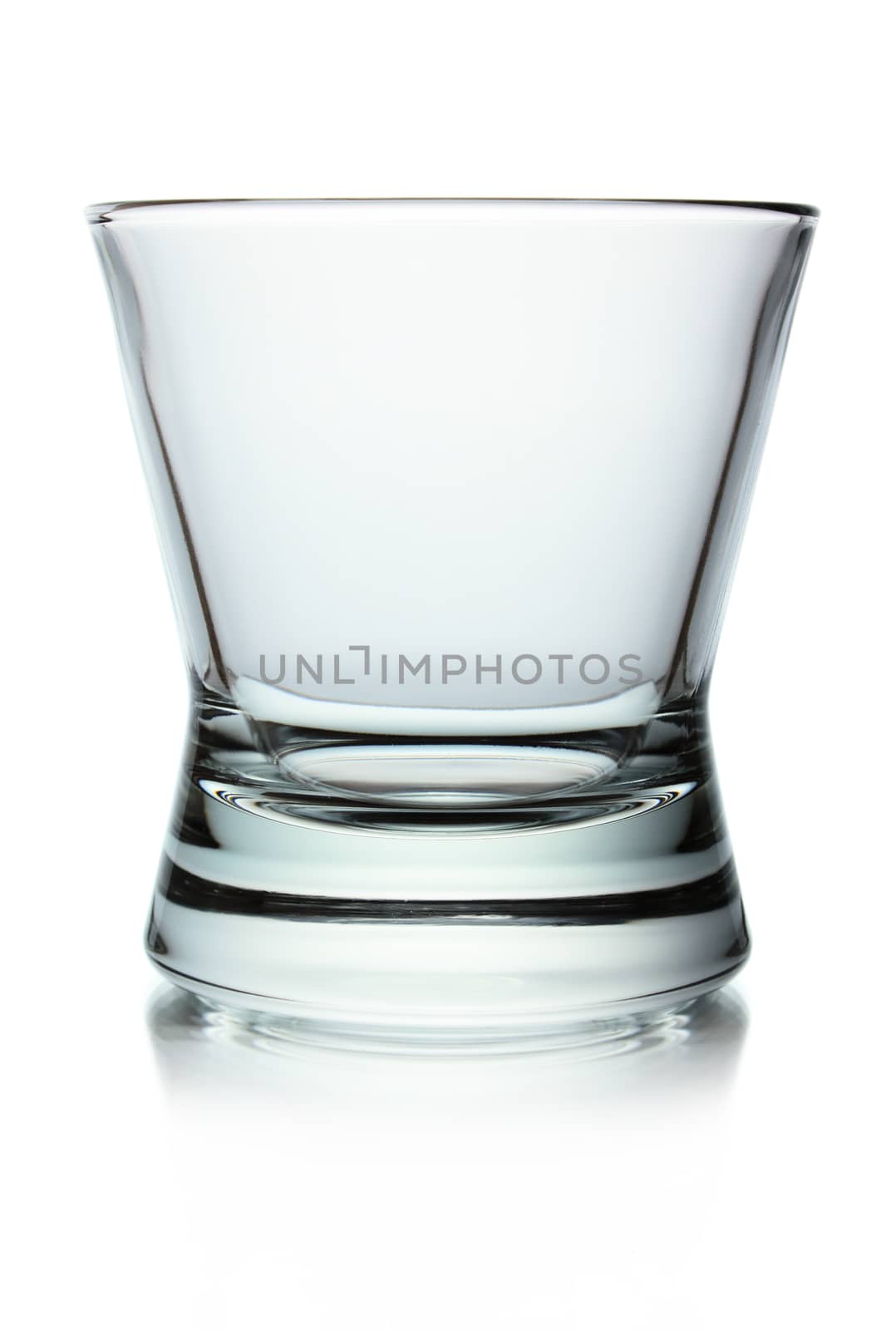 Empty glass for whiskey isolated on white background