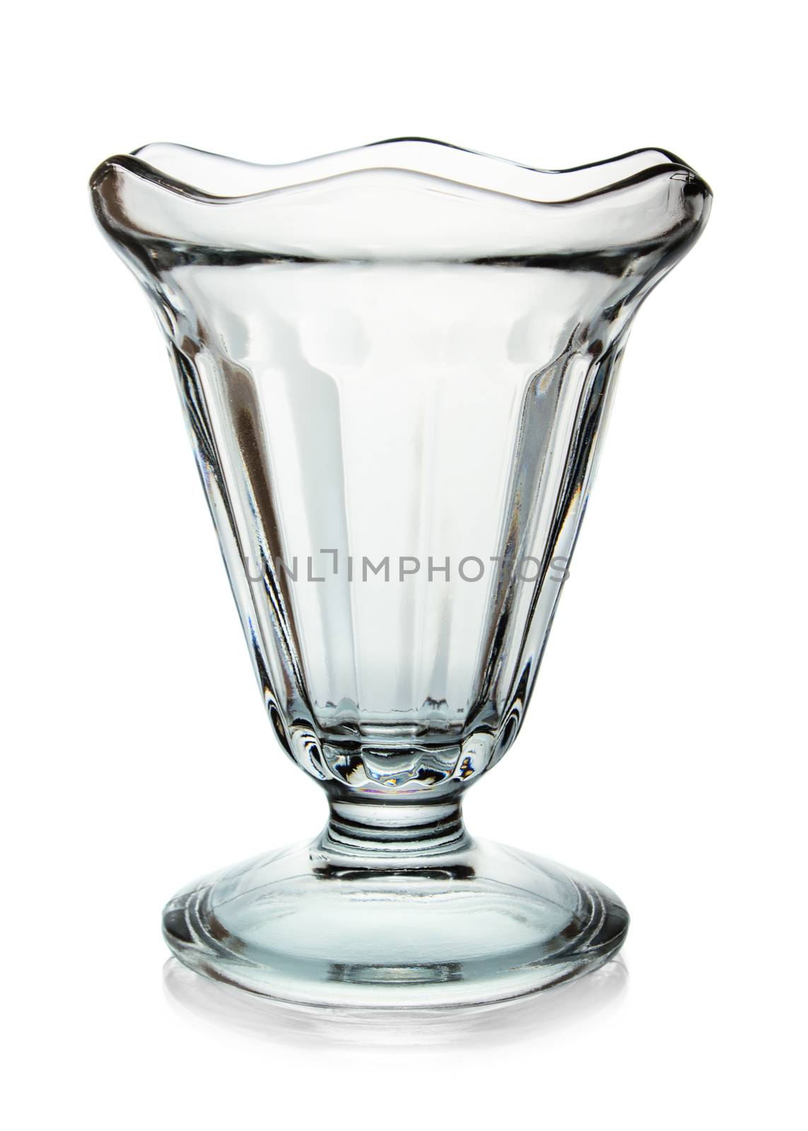 Empty dessert glass isolated on white background