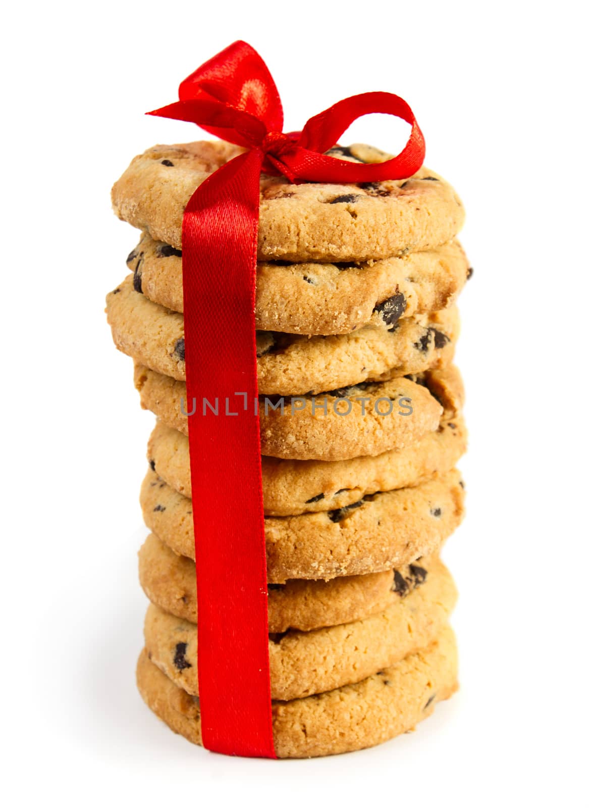 Cookies with red ribbon isolated on white background