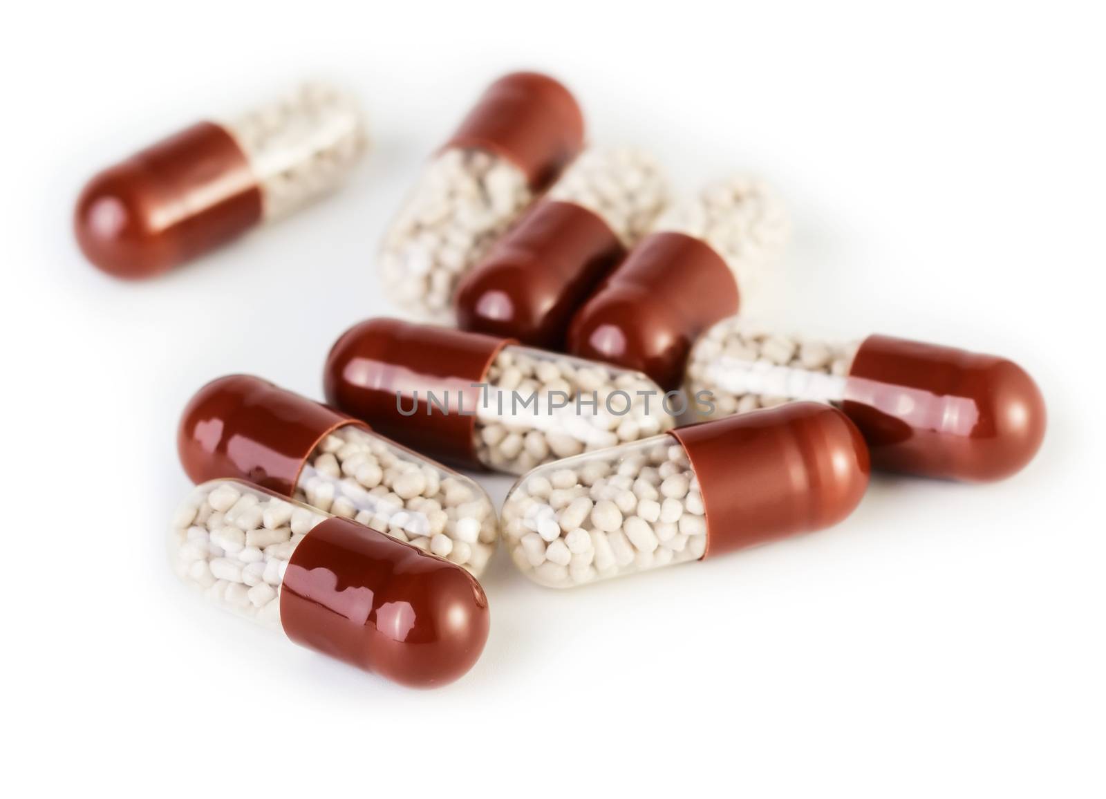 Medical background: capsules isolated on white