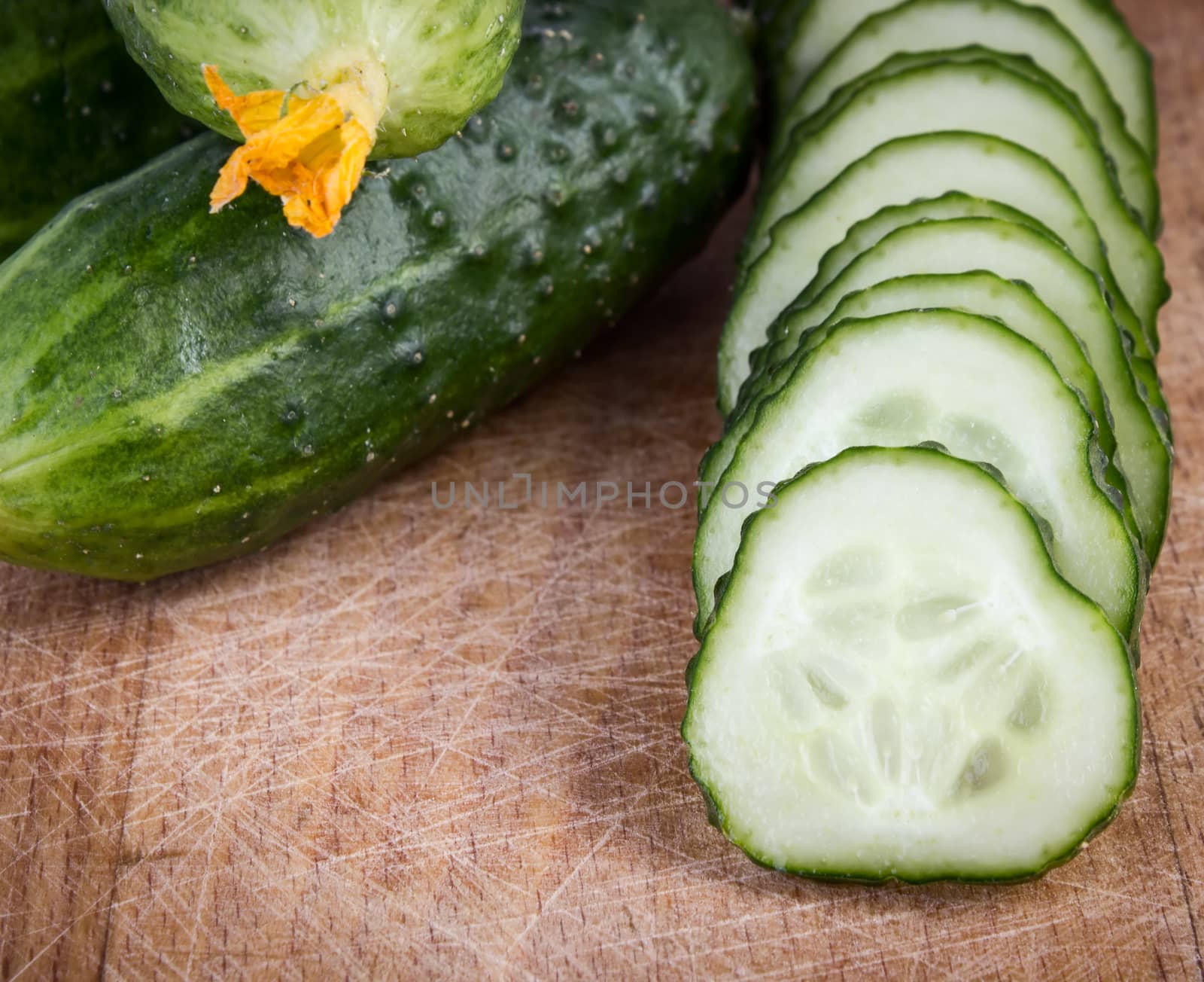 Cucumber slices on cutting board