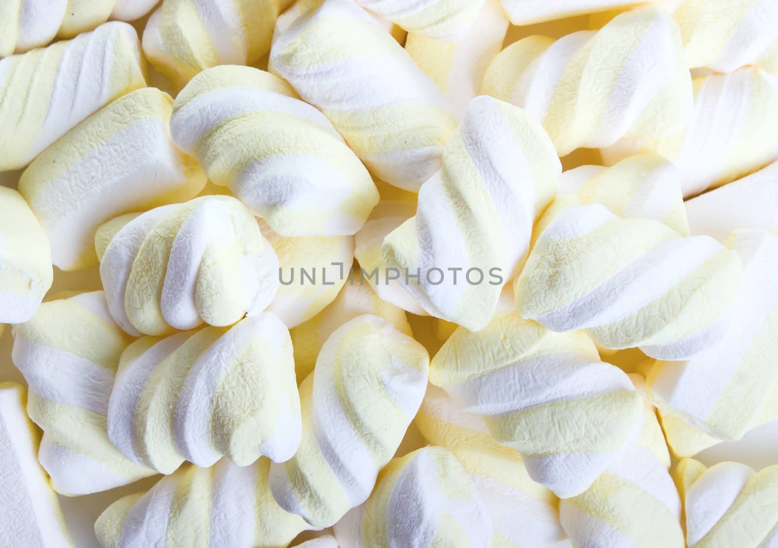 Sweet white and yellow marshmallow background