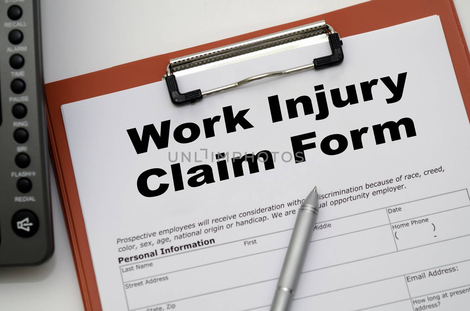 Claim form for a work injury on a desk top