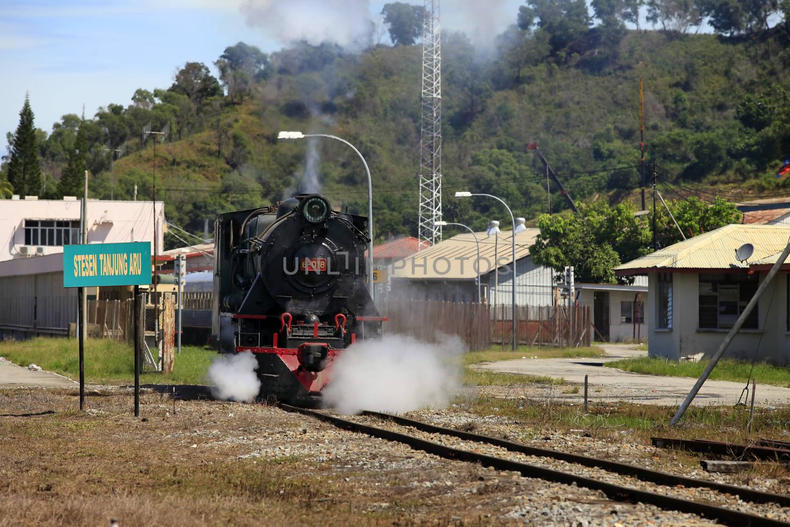 Kota Kinabalu, Malaysia - January 03, 2015: Tourist train North Borneo Railway is an old steam colonial era (engine runs on burning wood). This is a joint project between the railroad and the resort Sabah Sutera Harbour Resort. Currently, tourist train runs from Tanjung Aru in Papar, 38.5 km route.