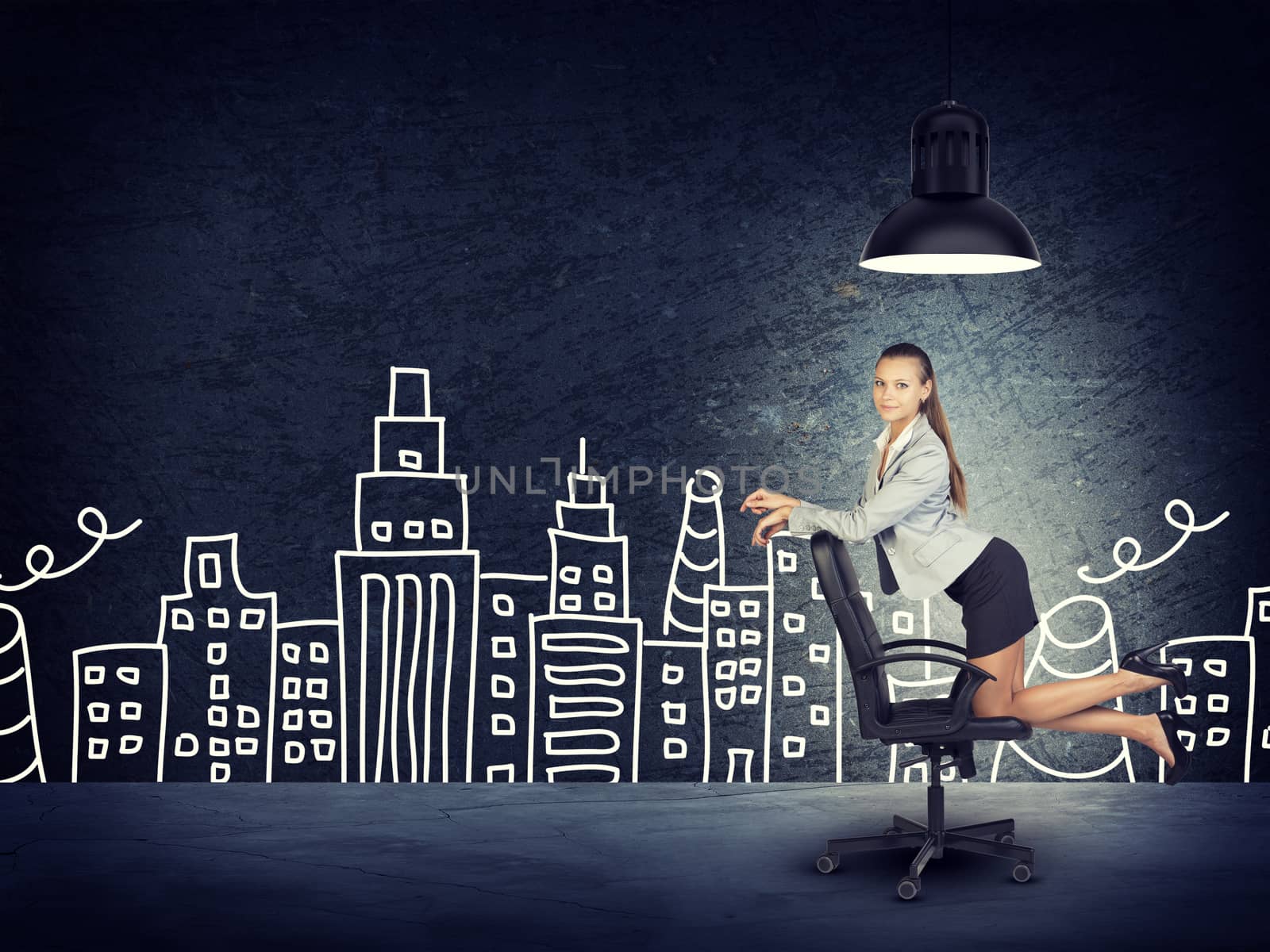Portrait of Young Businesswoman Kneeling on Office Chair Beneath Overhead Light in front of Illustration of City Skyline in Aspirational Concept Image
