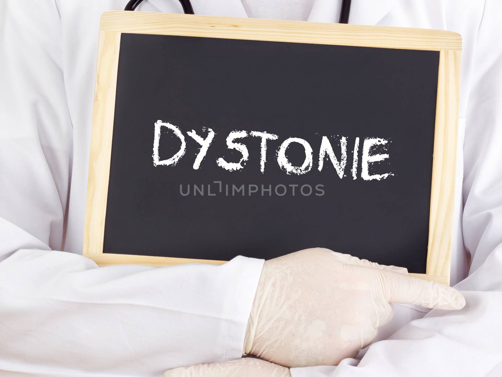 Doctor shows information on blackboard: Dystonia in german by gwolters