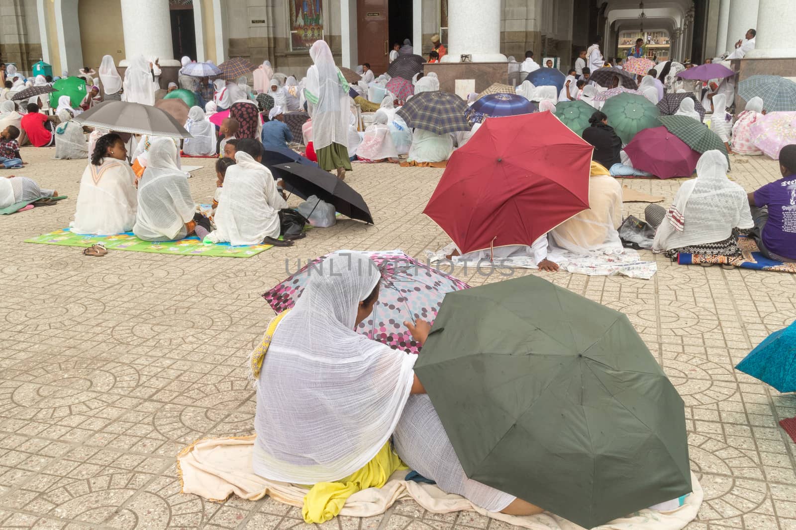 Addis Ababa: April 10: Devoted Ethiopian Orthodox followers observe Siklet, the crucifixion of Jesus Christ, at Bole Medhane Alem Church on April 10 ,2015 in Addis Ababa, Ethiopia