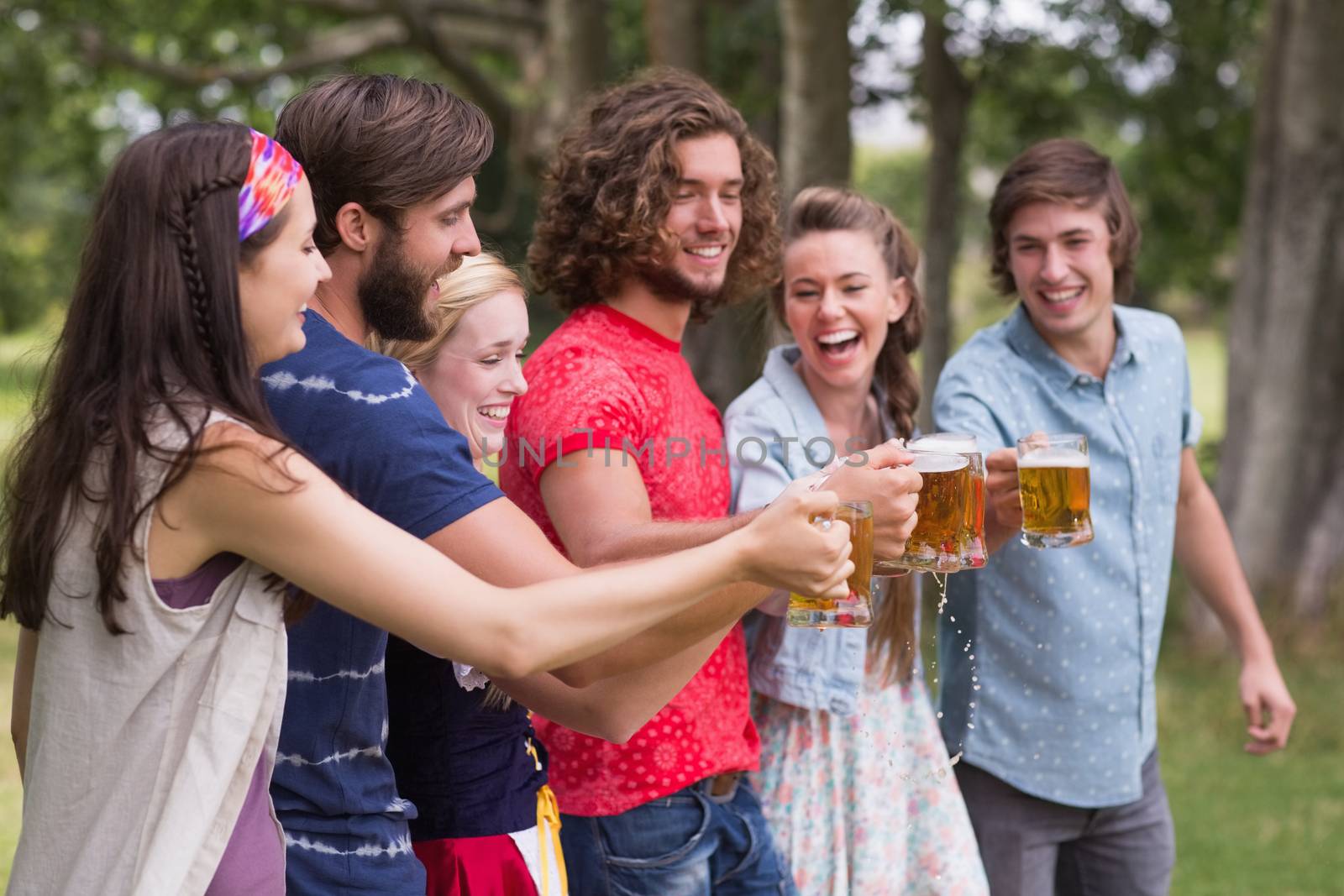 Group of friends celebrating oktoberfest by Wavebreakmedia