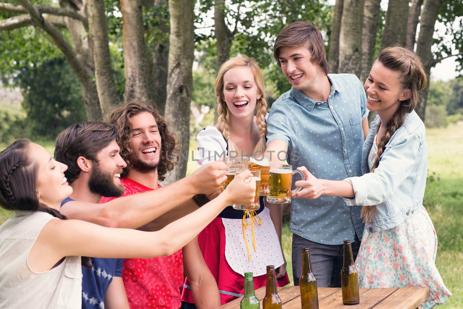 Group of friends celebrating oktoberfest by Wavebreakmedia