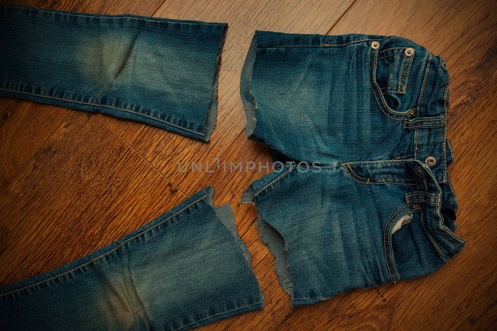 cut old jeans on wooden boards, instagram image style