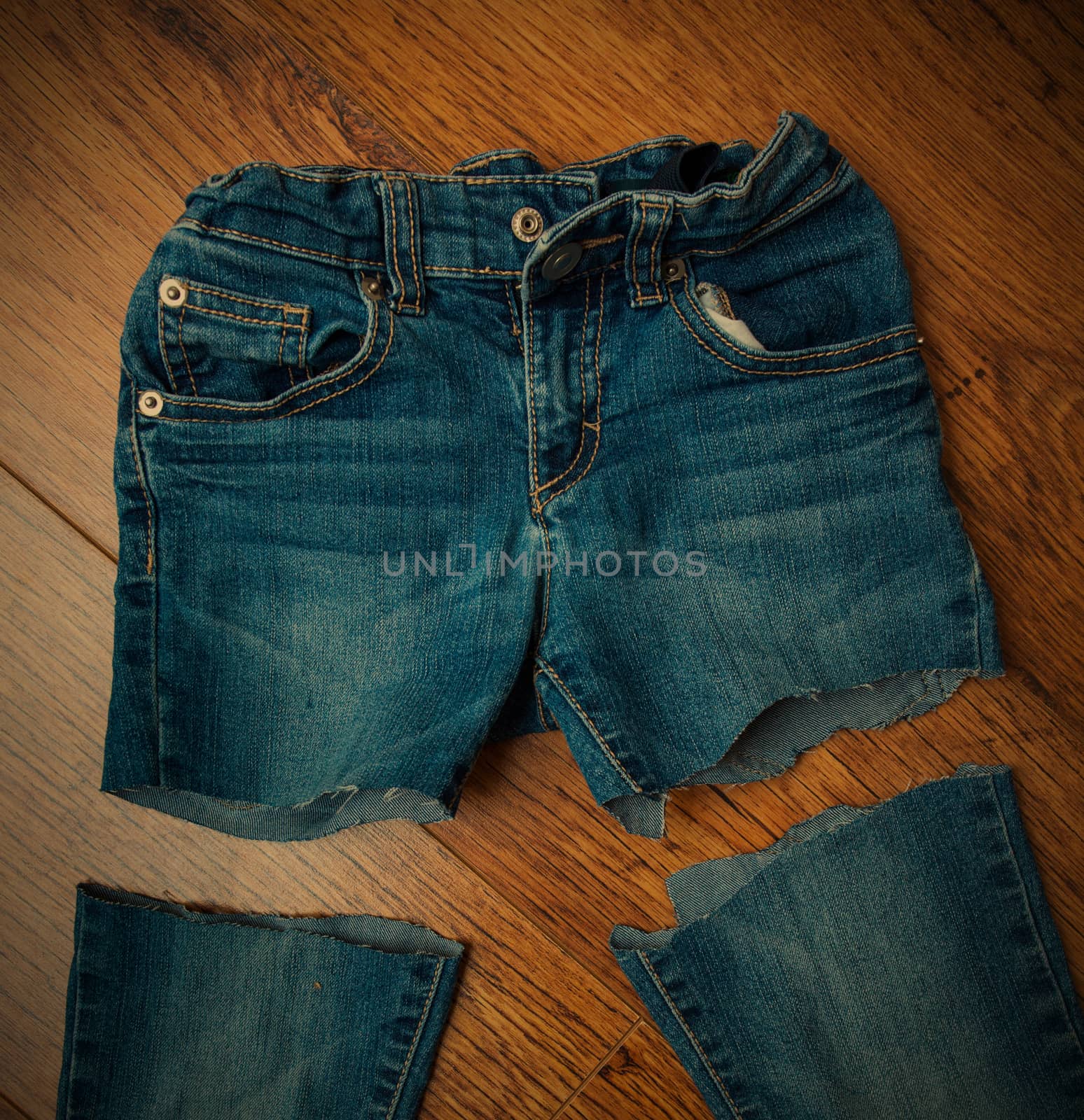 cut old jeans on wooden boards, instagram image style