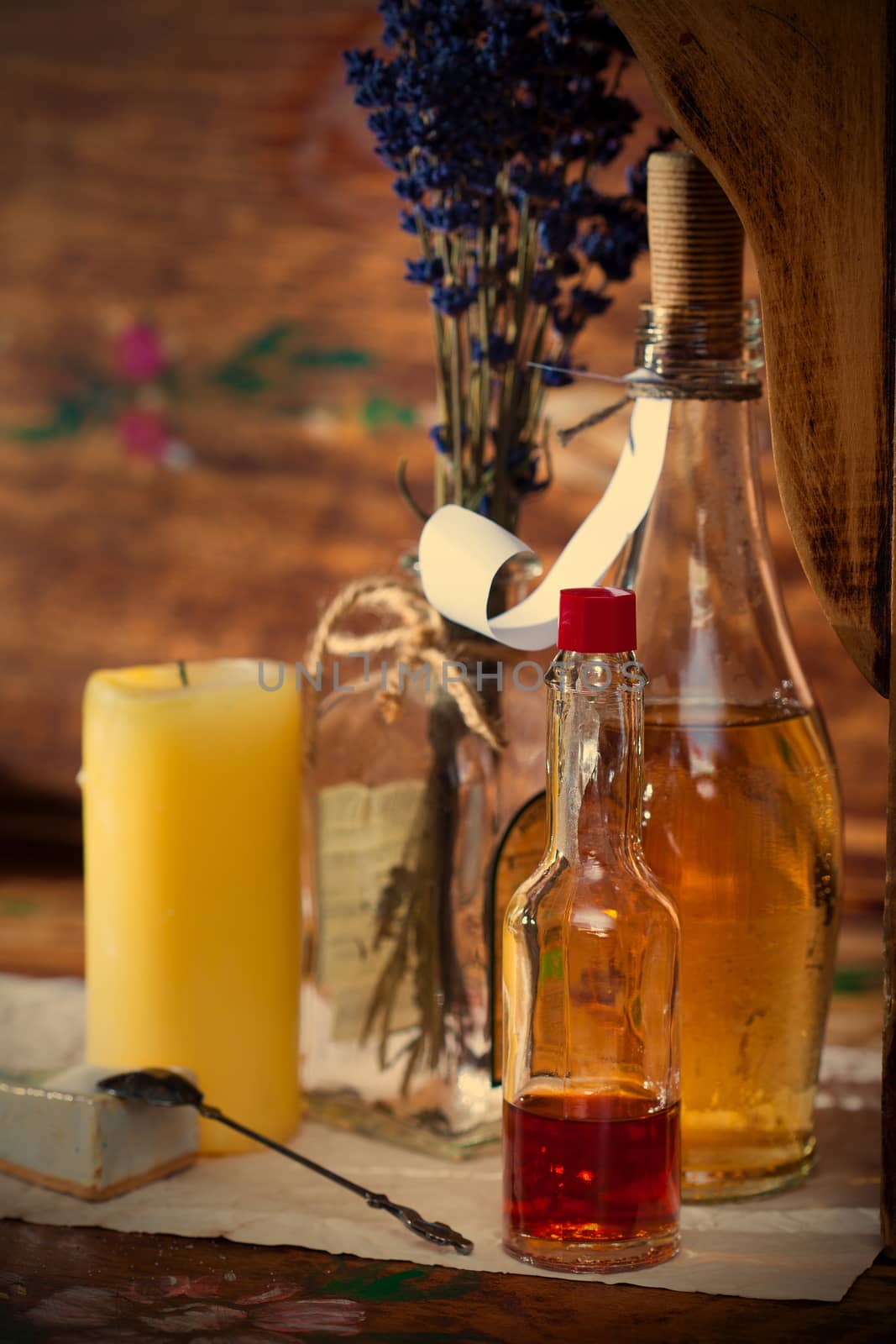 Vintage still life with pharmacy vials, dried calendula and a candle in an old drugstore, instagram image style 