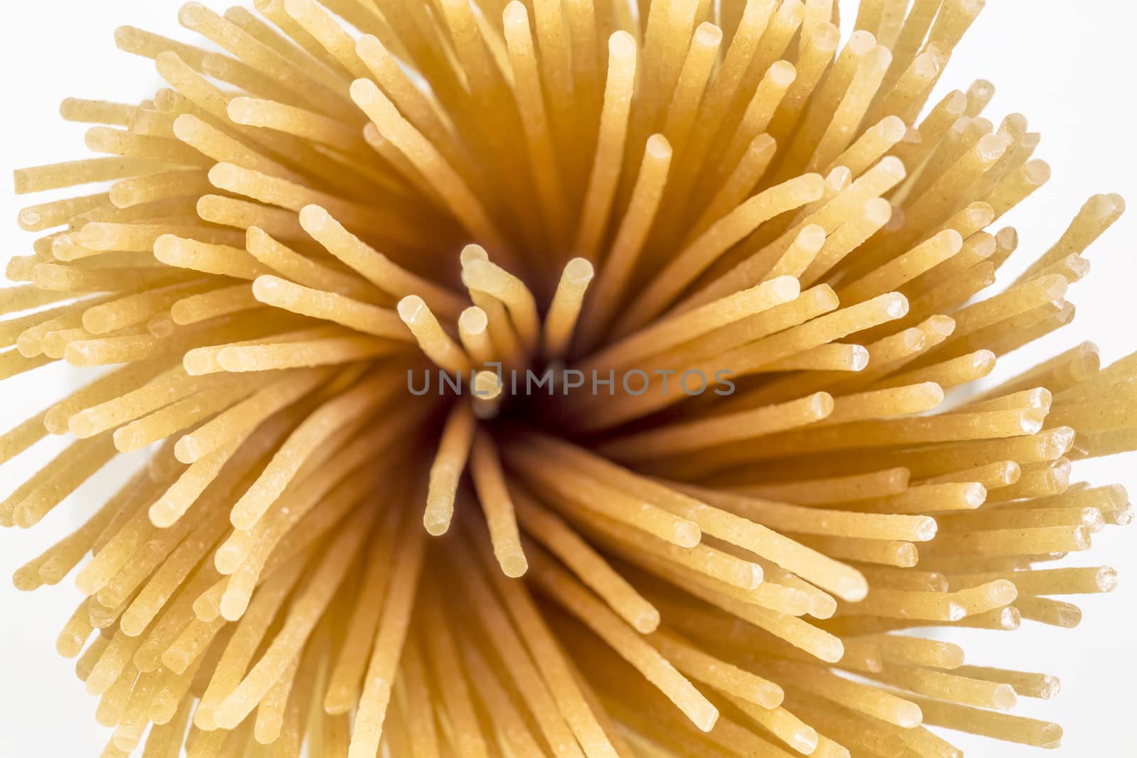 gluten free, brown rice pasta,  spaghetti style - top view at a bunch of uncooked noodles