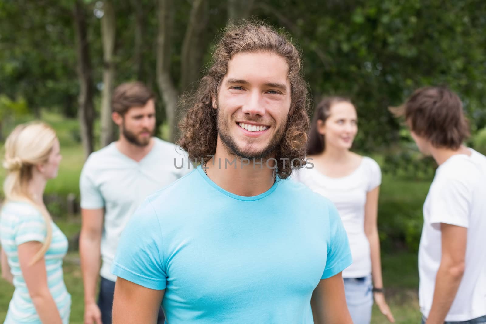 Young friends in the park by Wavebreakmedia