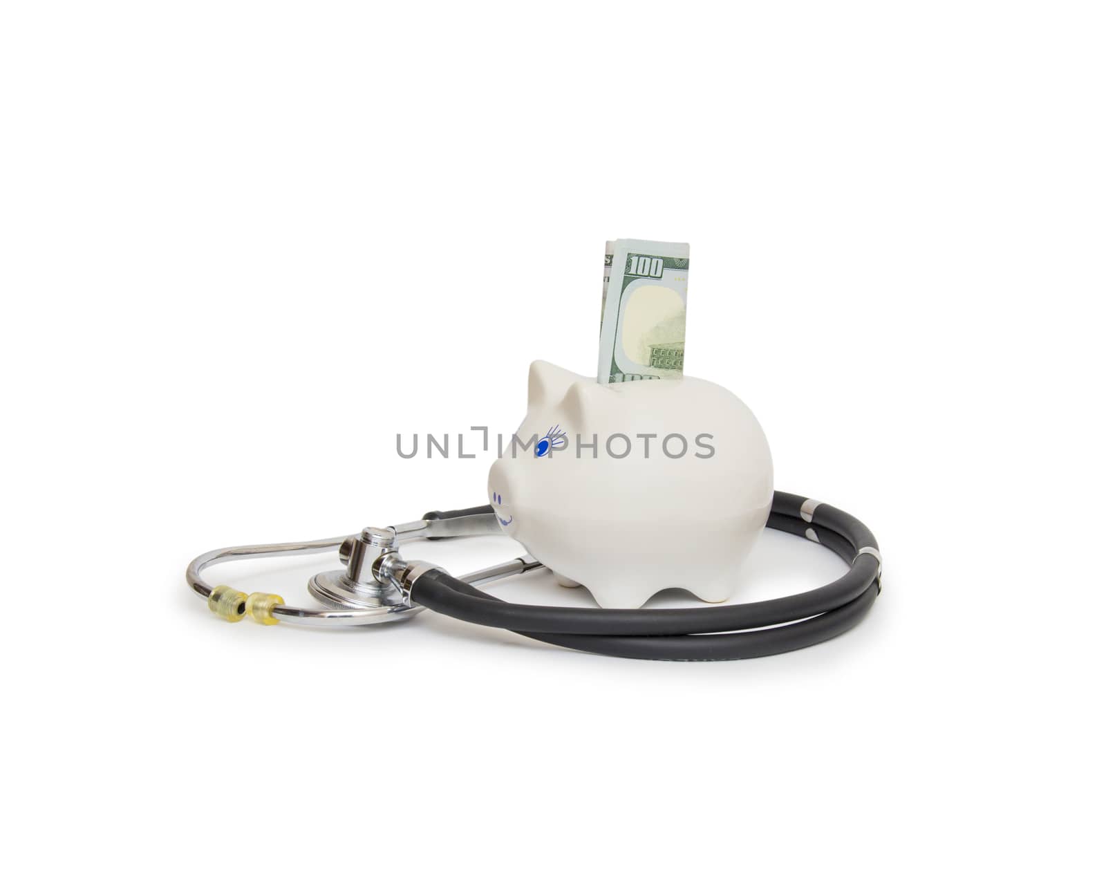  piggy bank with stethoscope isolated on white by cocoo