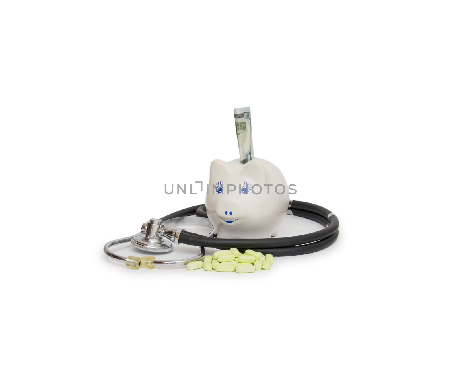 piggy bank with stethoscope isolated on white