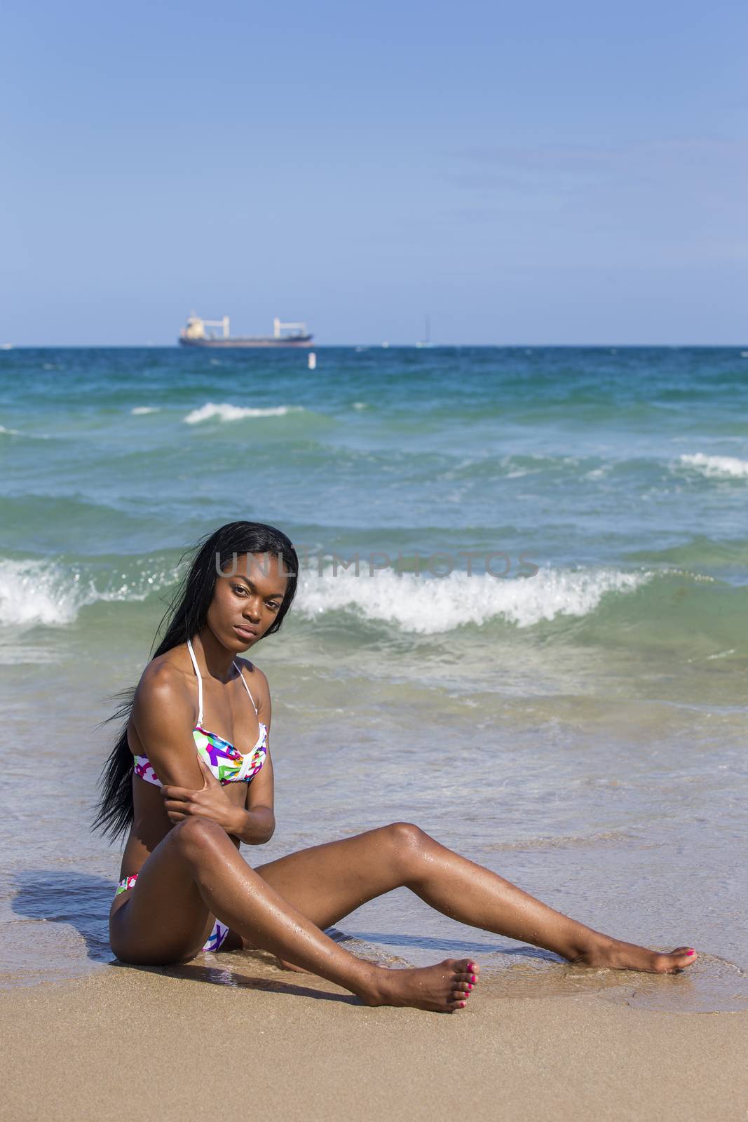 Portrait of a young black woman, outdoors. by BrazilPhoto