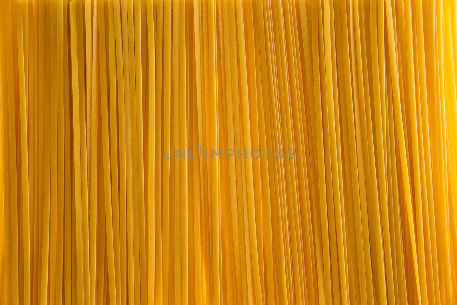 Full frame background of fettuccine pasta by coskun