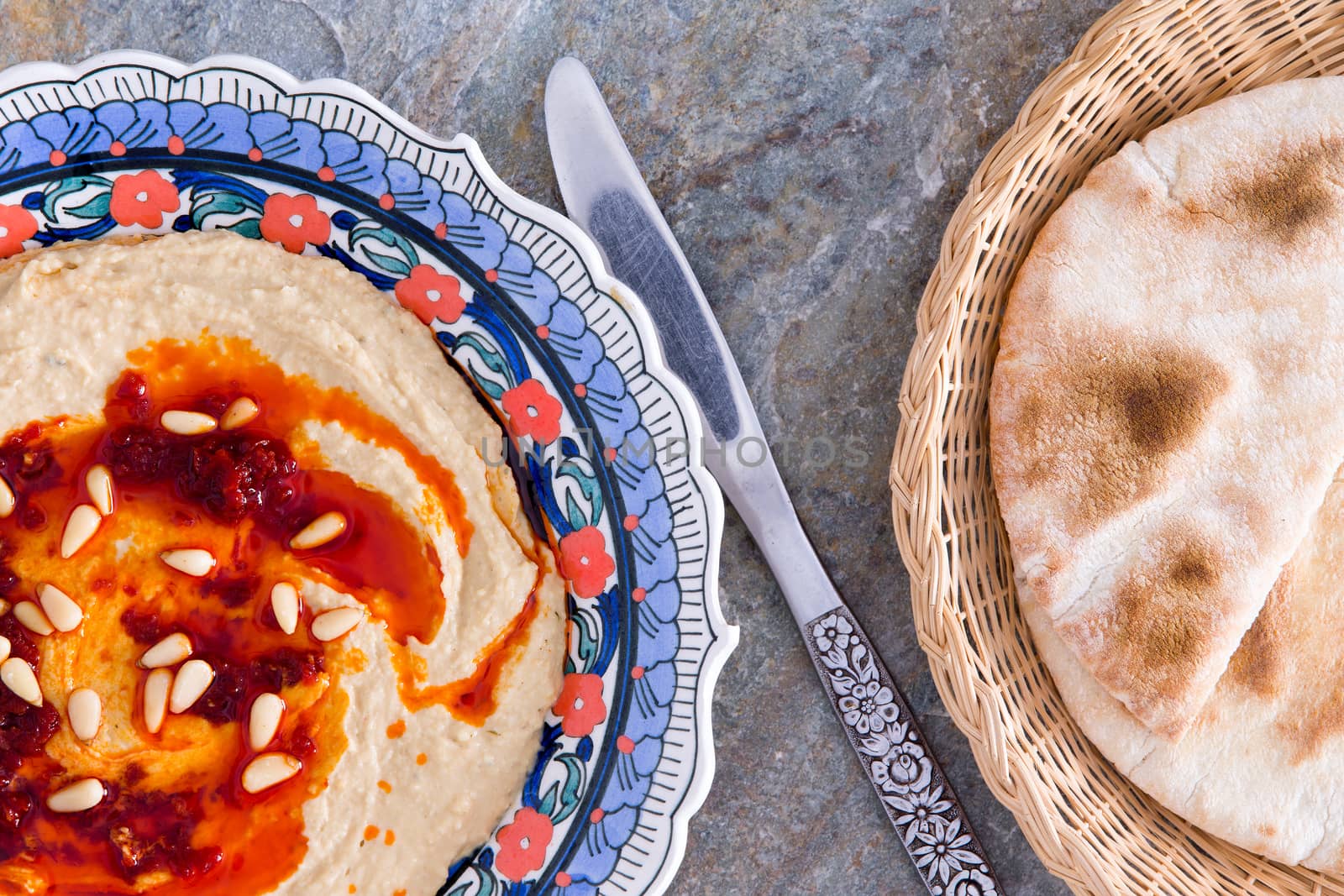 Hummus dip with pita bread by coskun