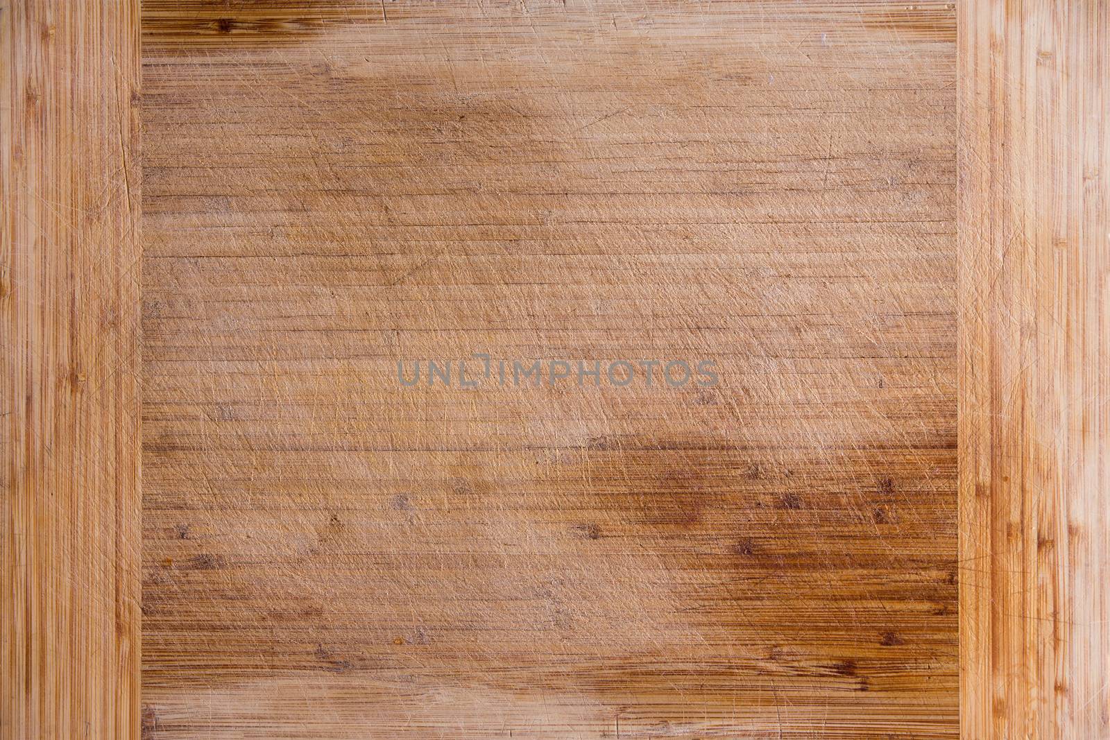 Close up Empty Old Bamboo Cutting Board for Backgrounds, Emphasizing Copy Space at the Center. Captured in High Angle View.