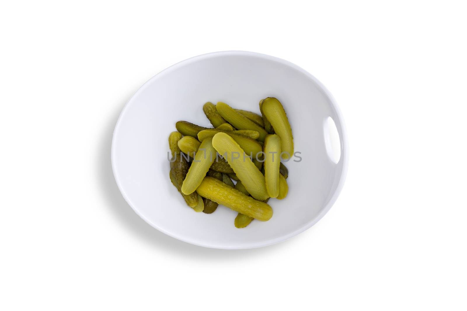 Close up Pickles for Your Taste Buds on a Contemporary Glossy Bowl Isolated on a White Background. Captured in High Angle View.