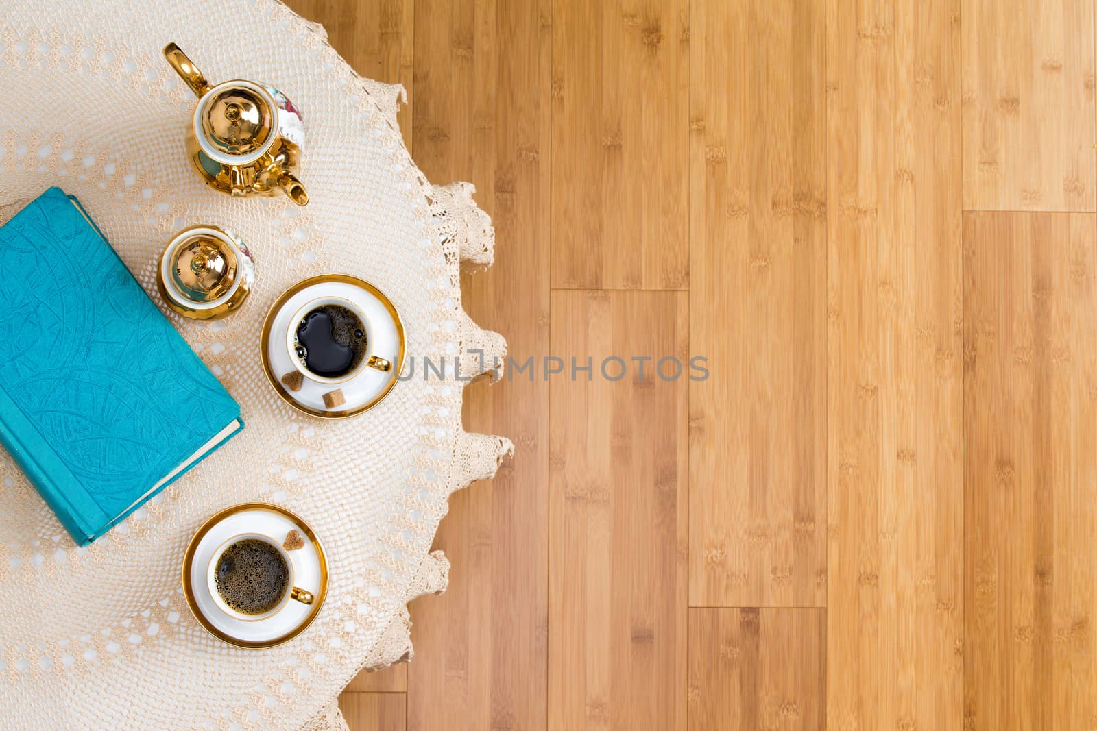 Turkish Coffee on White Table with a Book by coskun