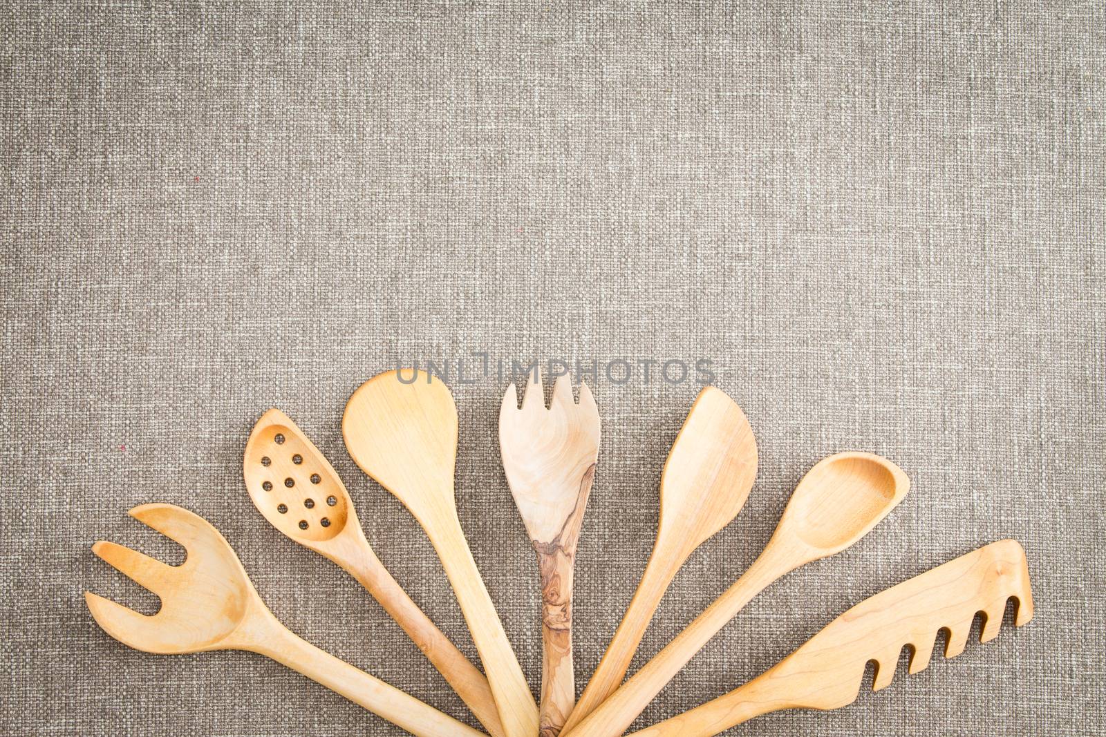 Fanned display of wooden kitchen utensils by coskun