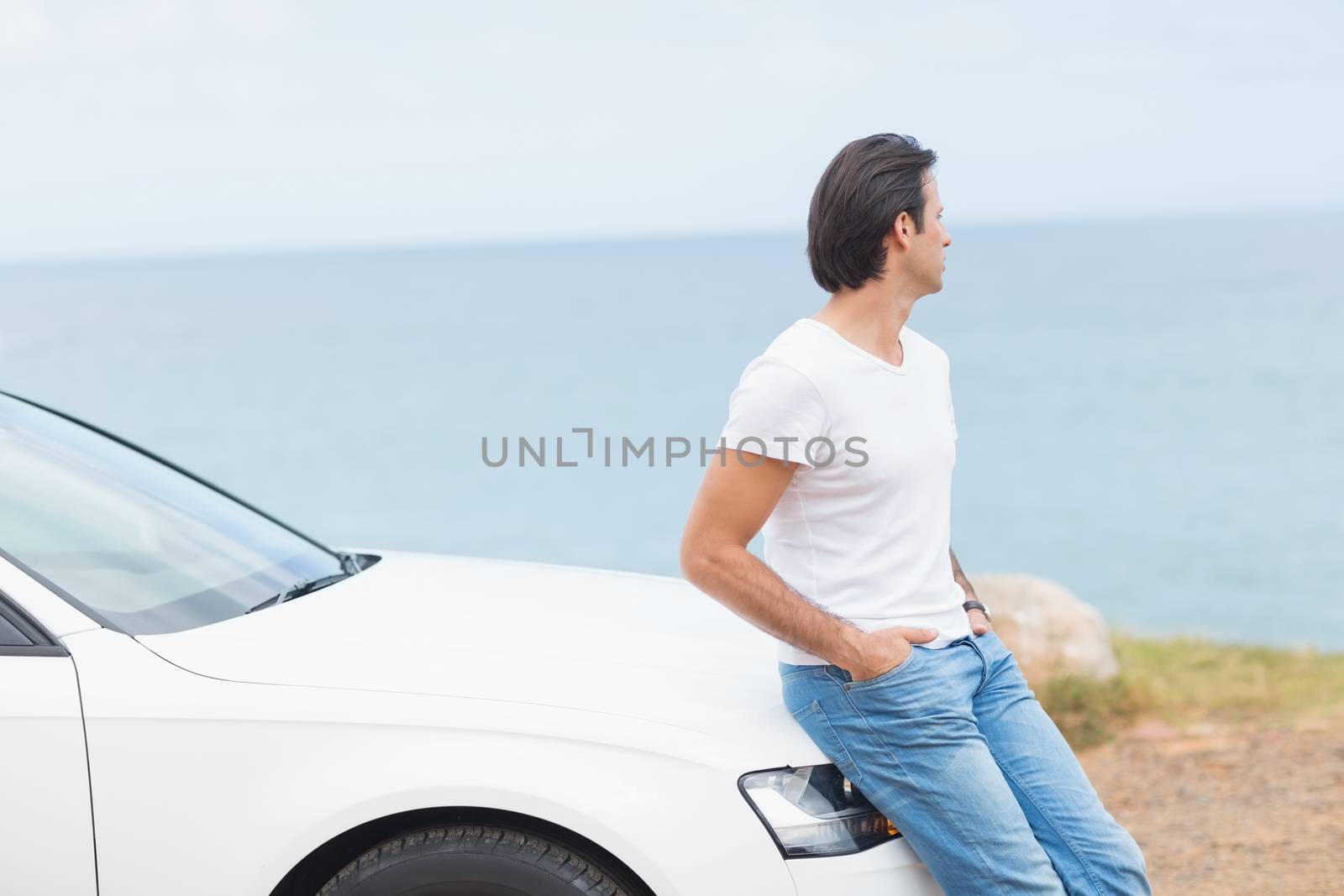 Man looking at the view outside his car