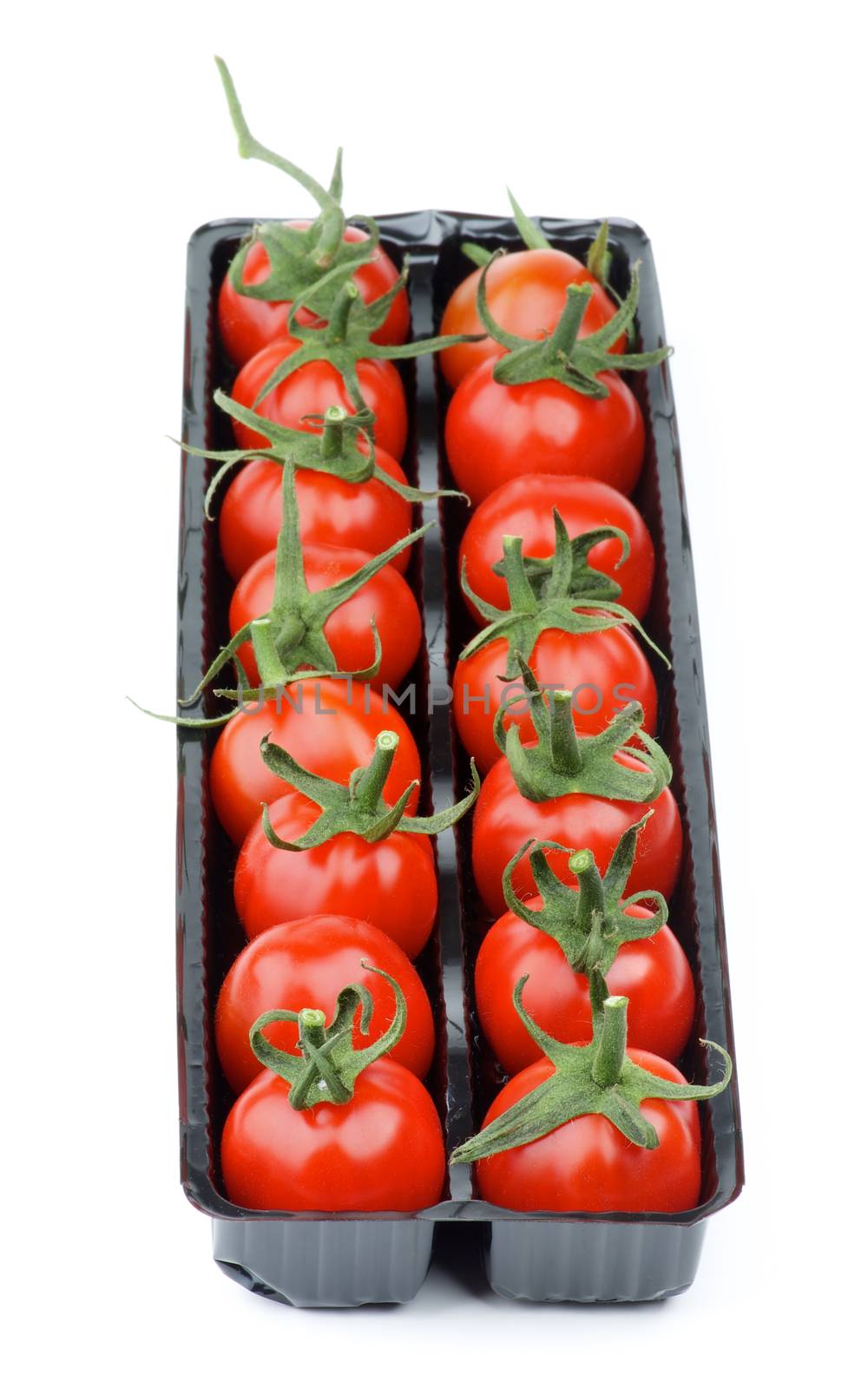 Perfect Ripe Cherry Tomatoes with Stems in Black Plastic Container isolated on white background. Focus on Foreground