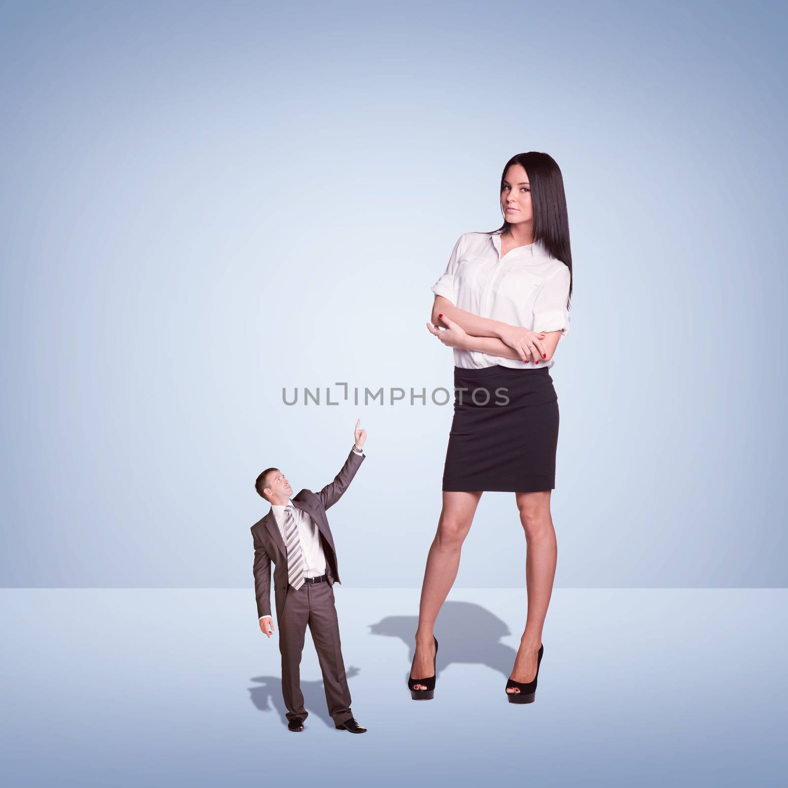 Lagre Young Businesswoman and small Businessman by cherezoff