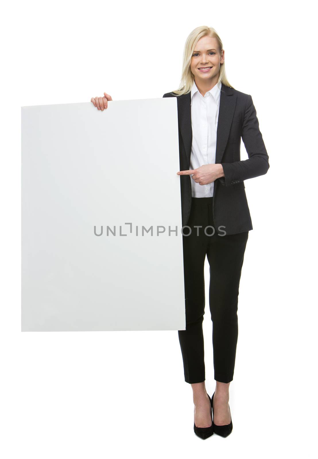 blonde smiling businesswoman with white placard