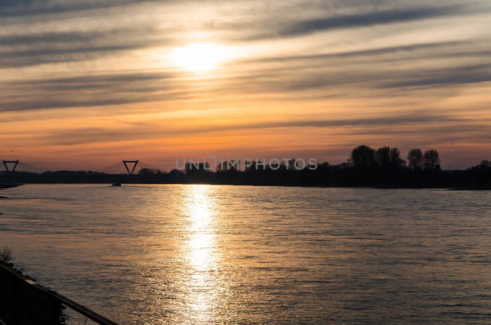 Sunset over the Rhine. Admission to Dusseldorf Kaiserwerth.