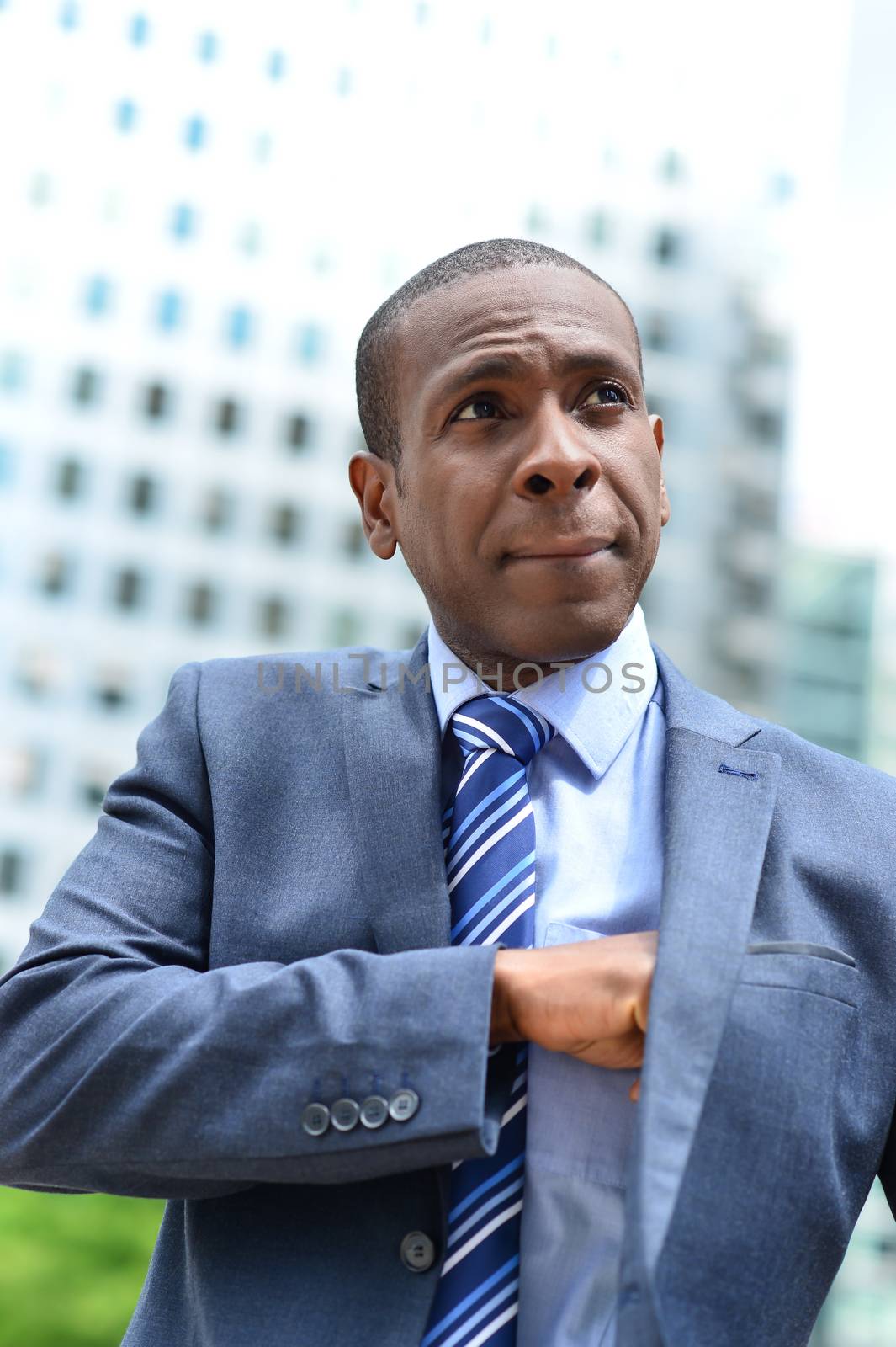 Businessman taking a cash from his suit  pocket