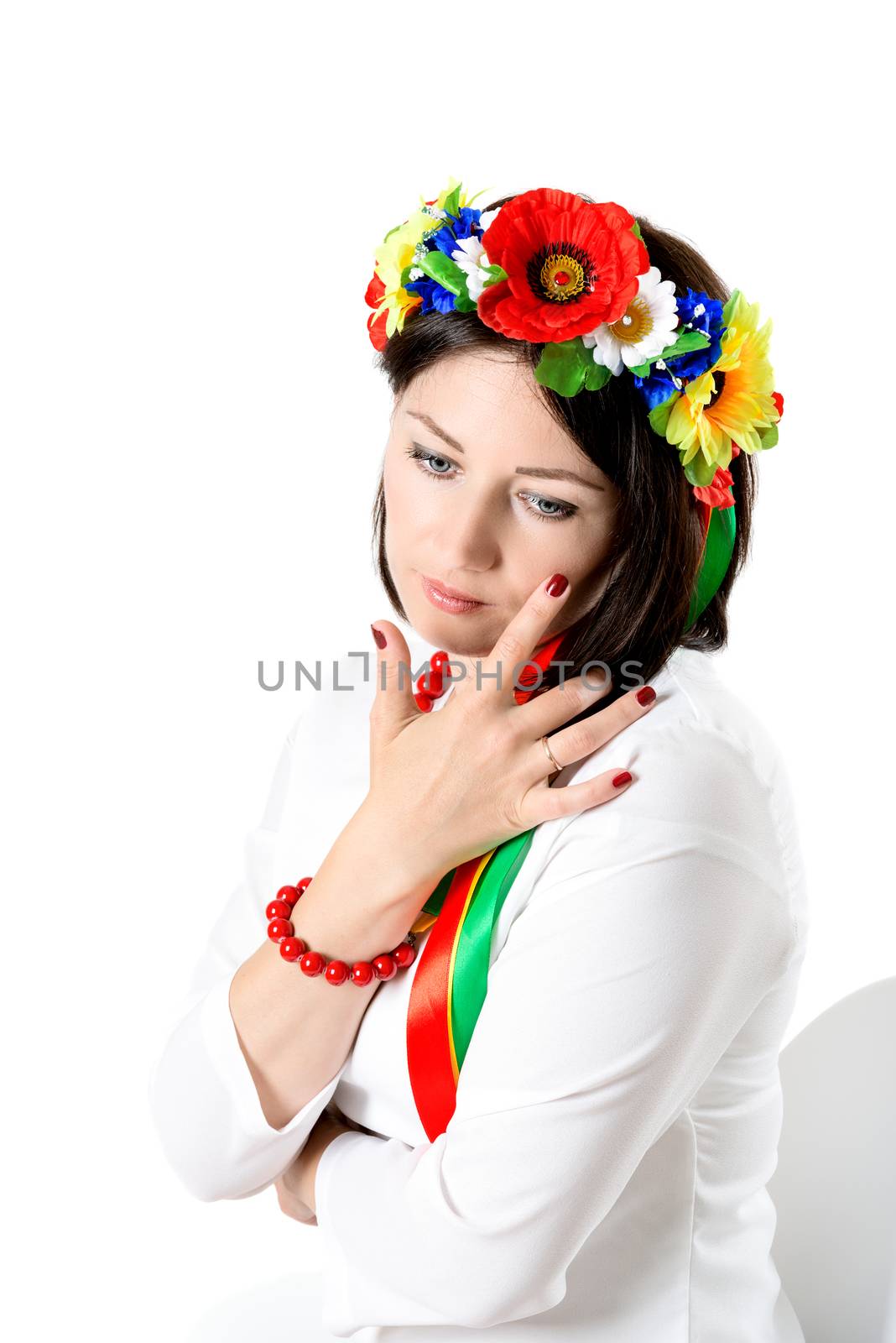 beautiful young brunette woman wearing national ukrainian clothe by Nanisimova
