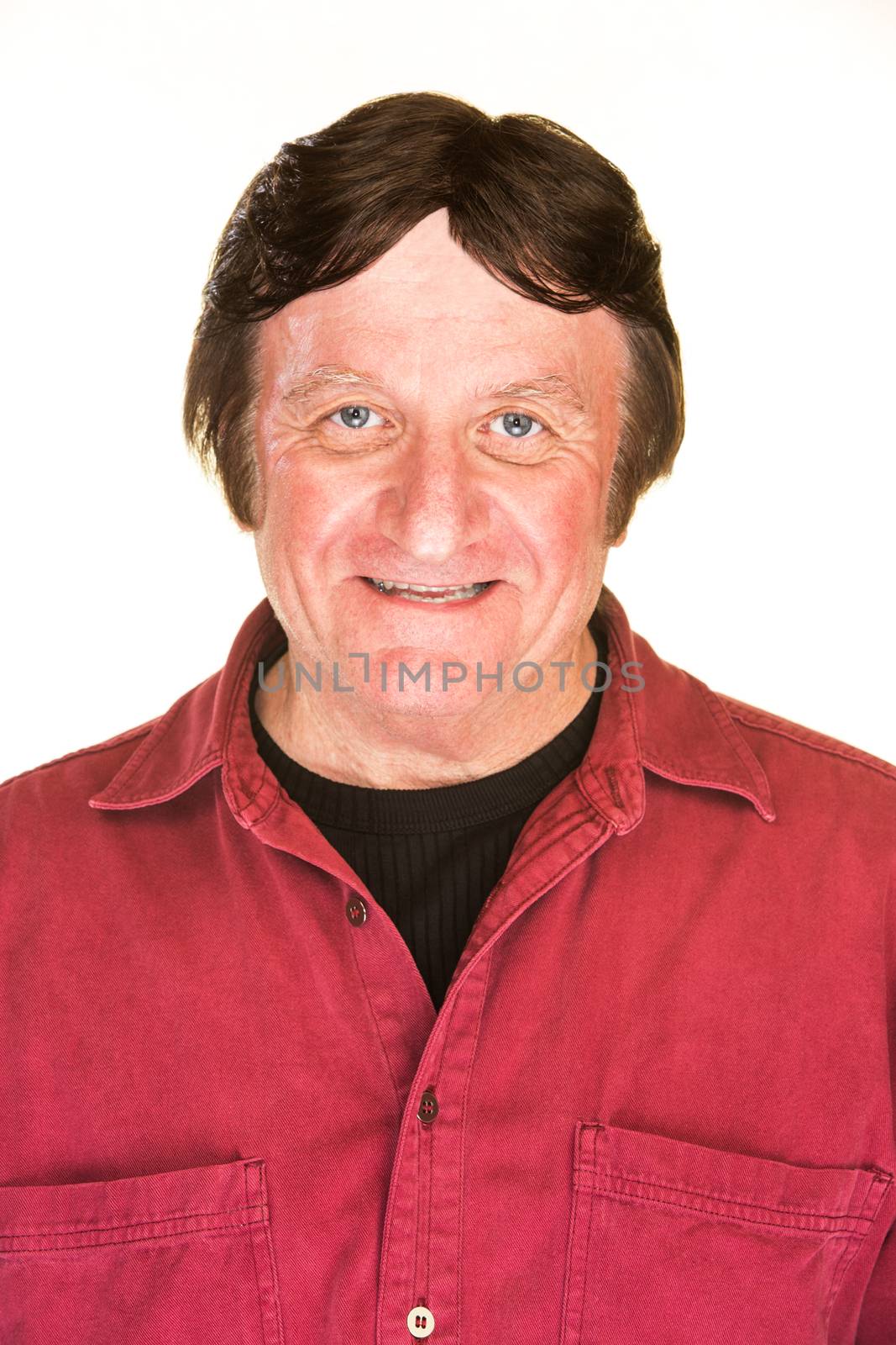 Grinning middle aged male over white background