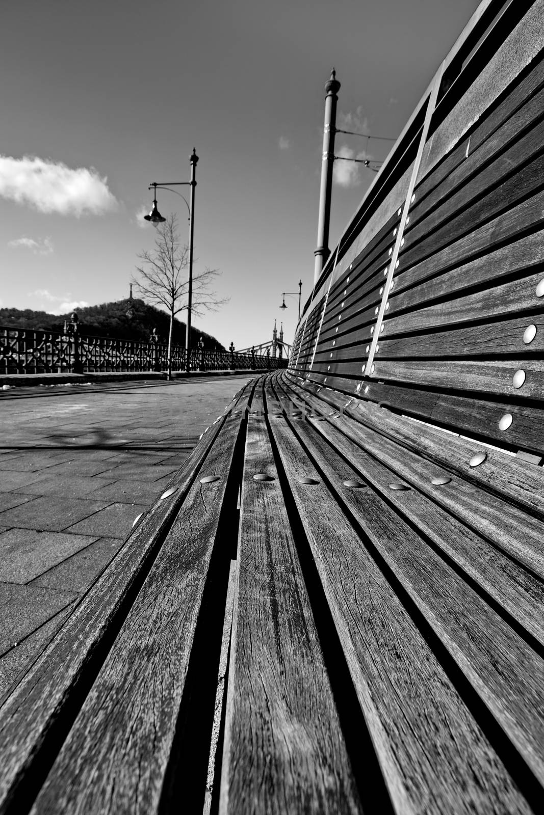 Empty bench in the city by anderm