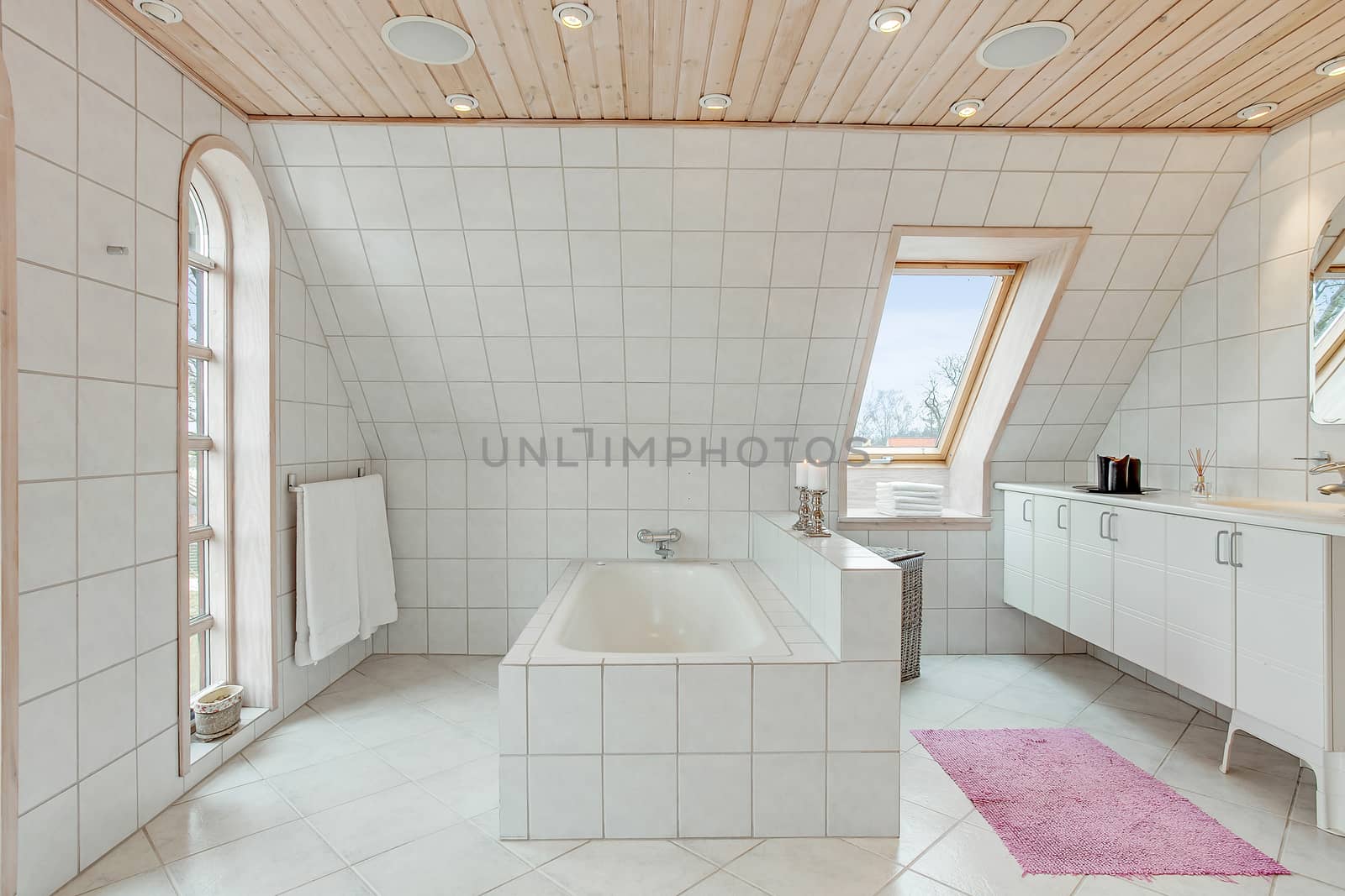 luxury tiled white bathroom in a traditional Danish home