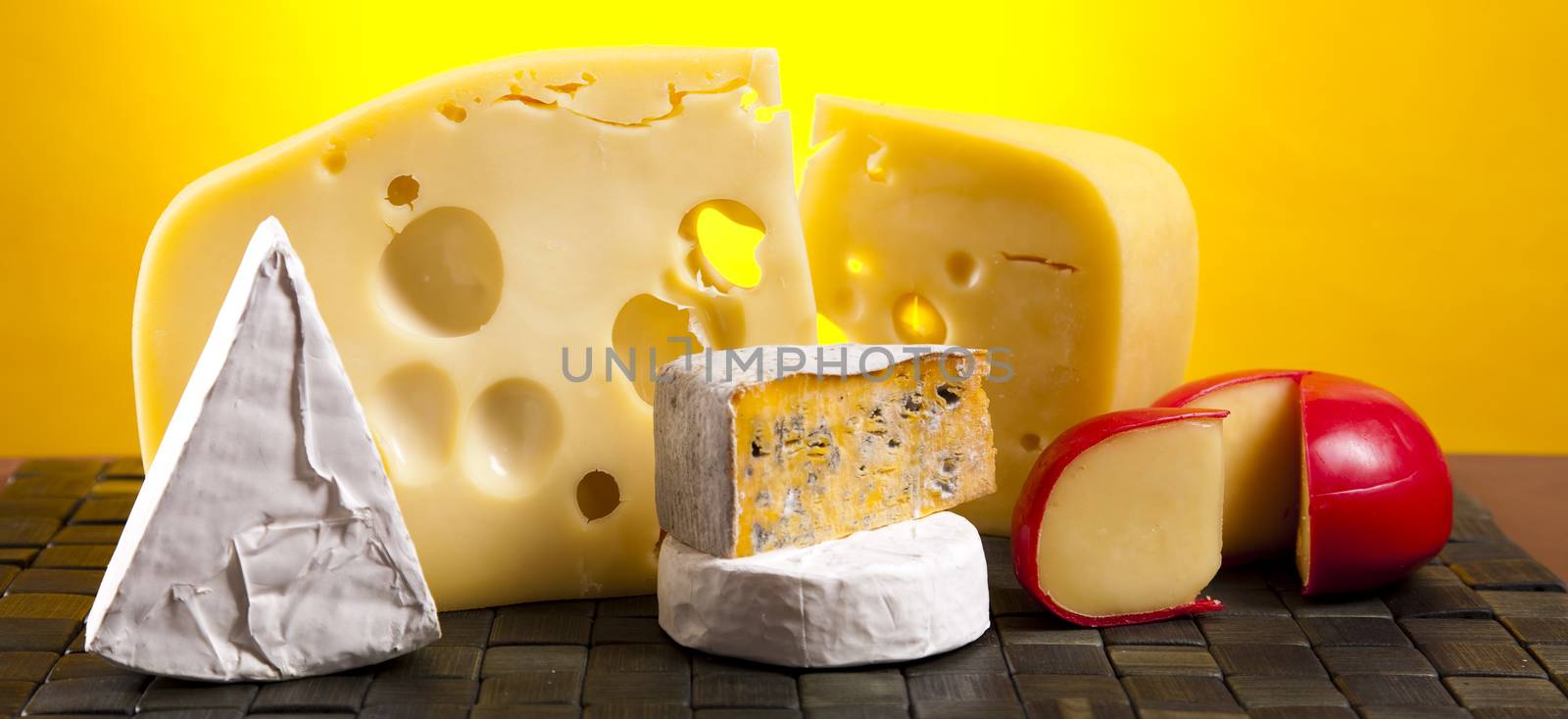Cheese still life, saturated ambient rural theme