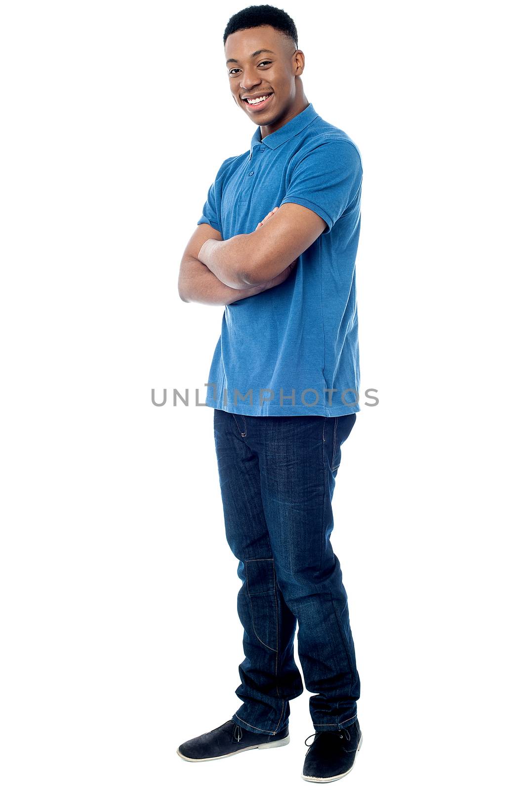Young confidence man posing by stockyimages